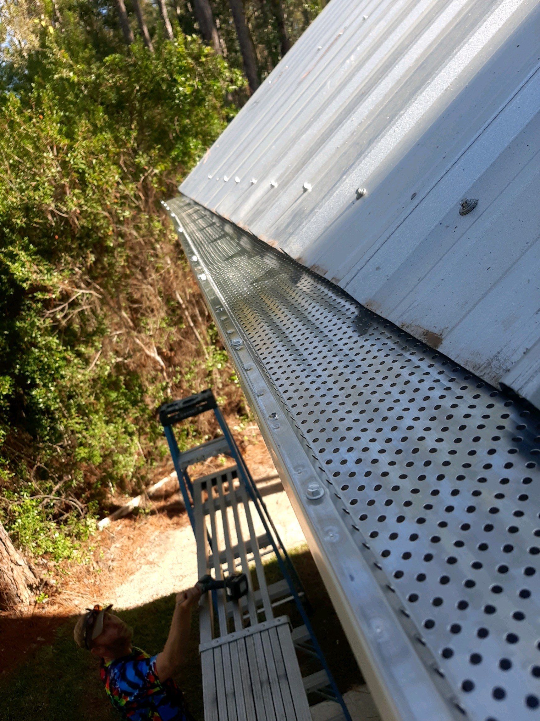 Gutter Installation using K-Style Seamless Gutters and Gutter Guards by Gutter Professors
