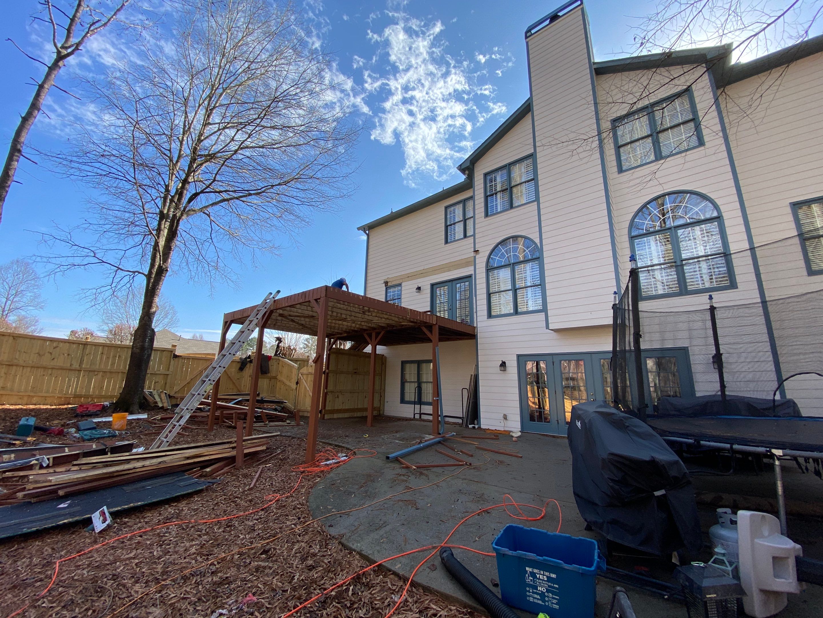 Covered Porch Addition and Custom Privacy Fence Installation in Alpharetta by Swift Home Renovations