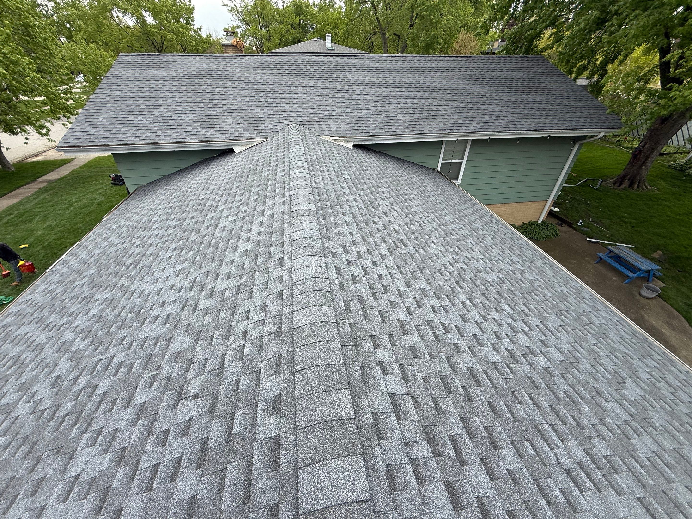 Roof replacement and chimney flashing by Optimal Home Improvement 