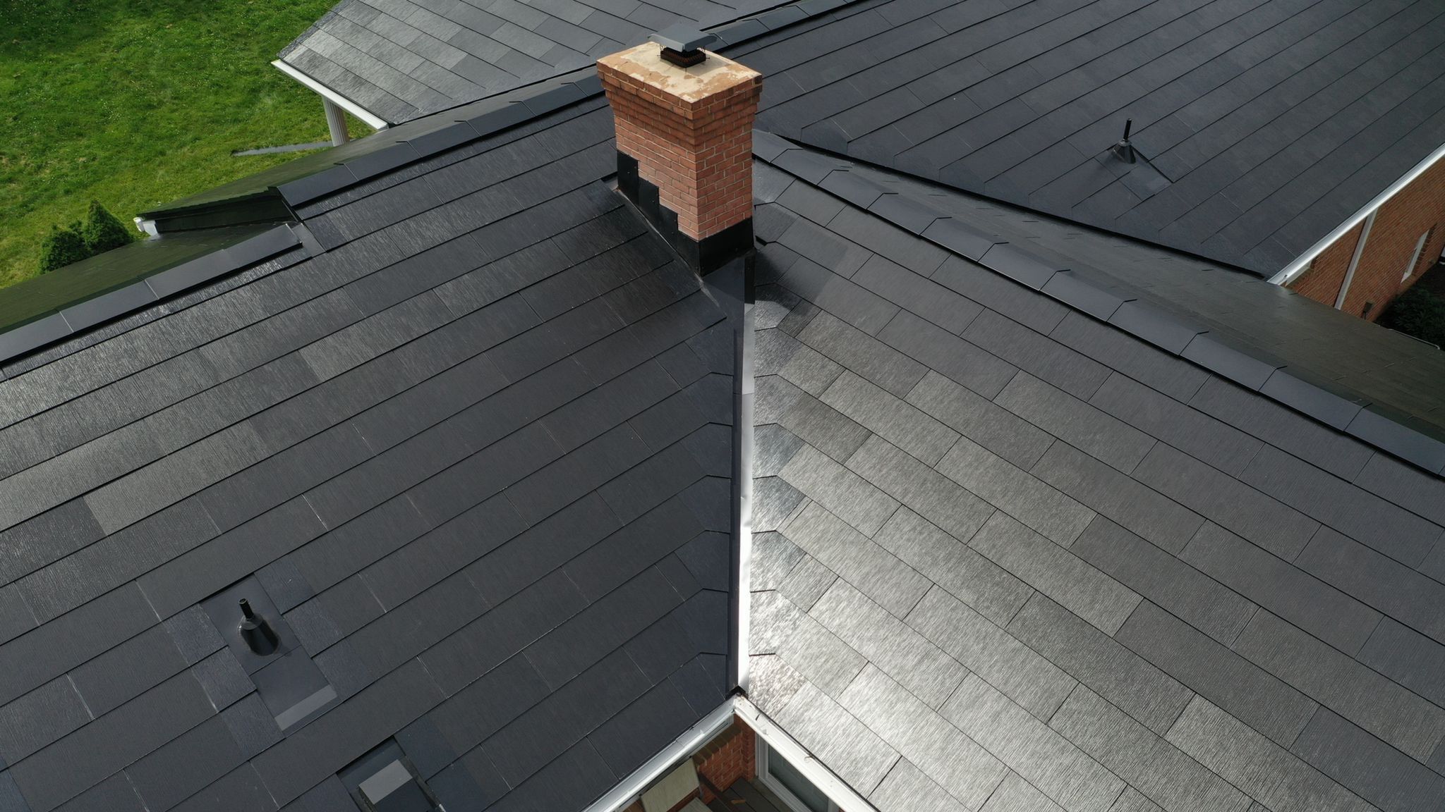 Tesla Solar Roof Installation by American Home Contractors