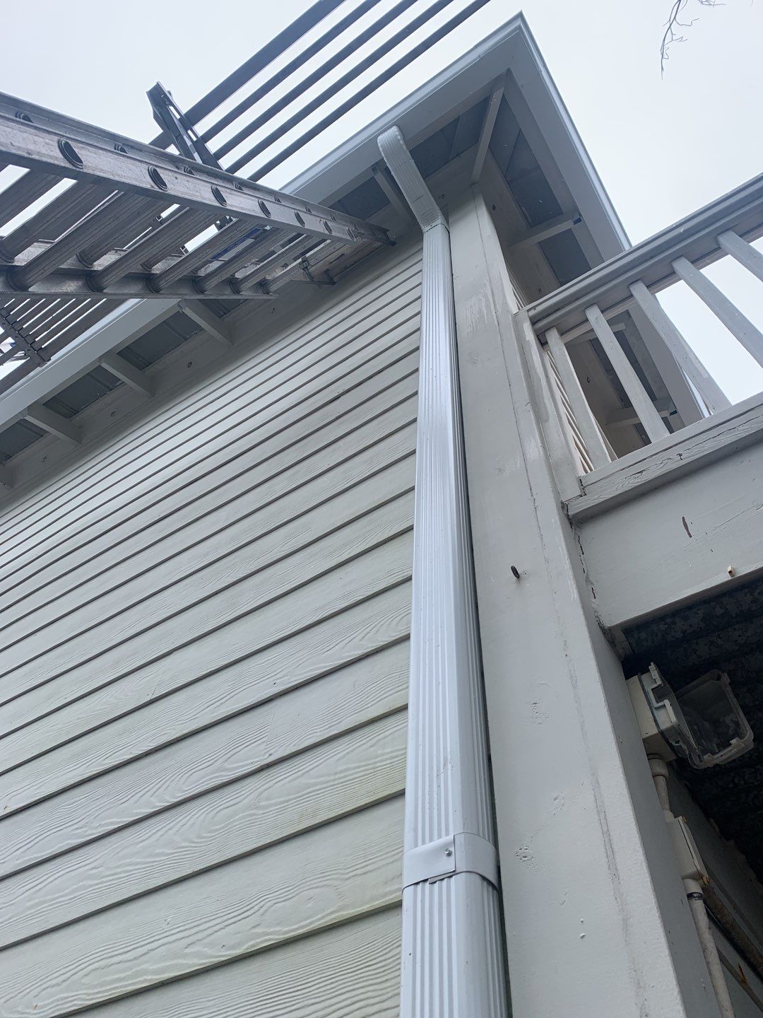 Seamless Gutter Installation Using White K-Style Gutters by Gutter Professors