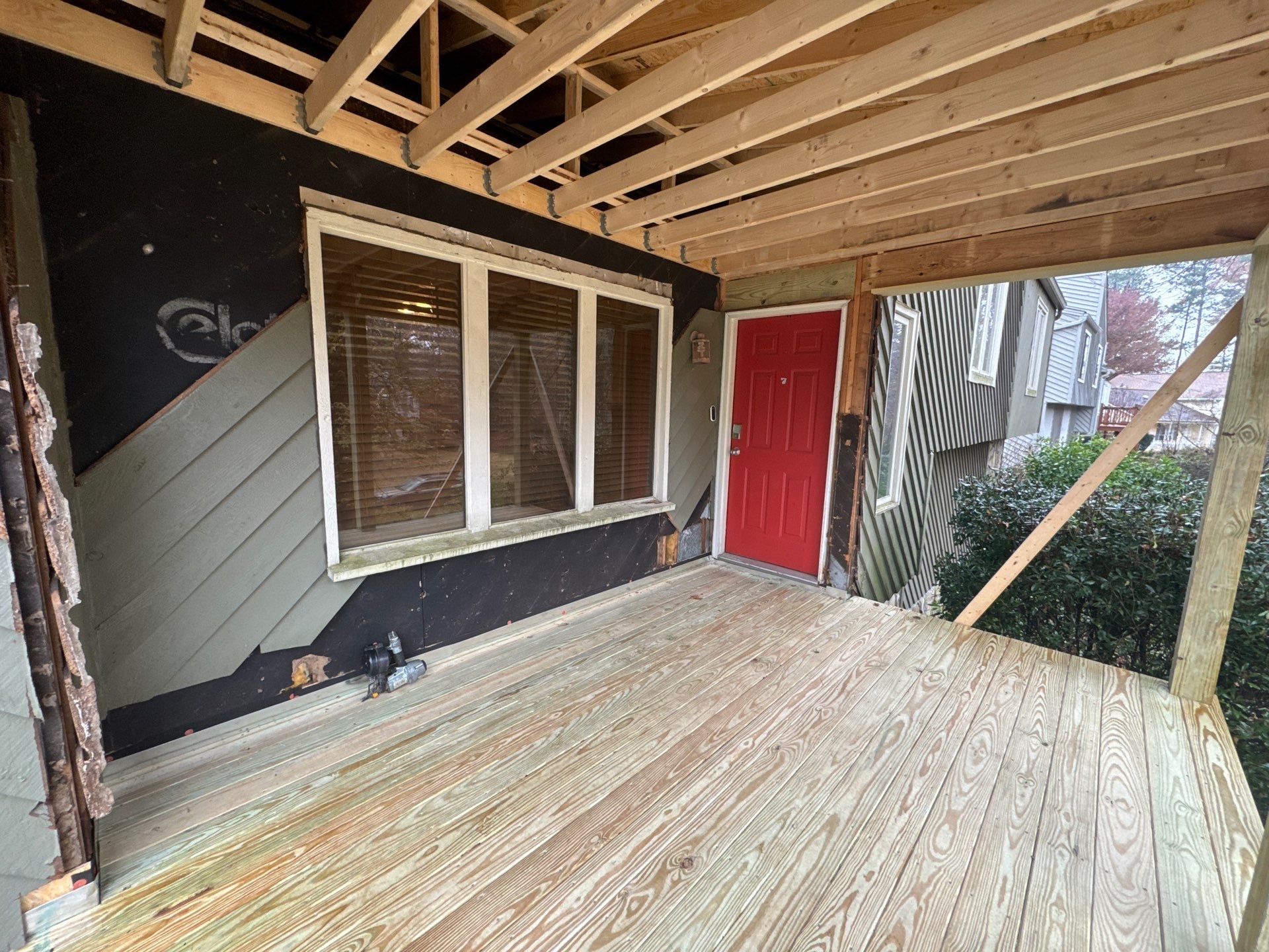 Elevated Wood Deck and Siding Replacement in Marietta by Swift Home Renovations