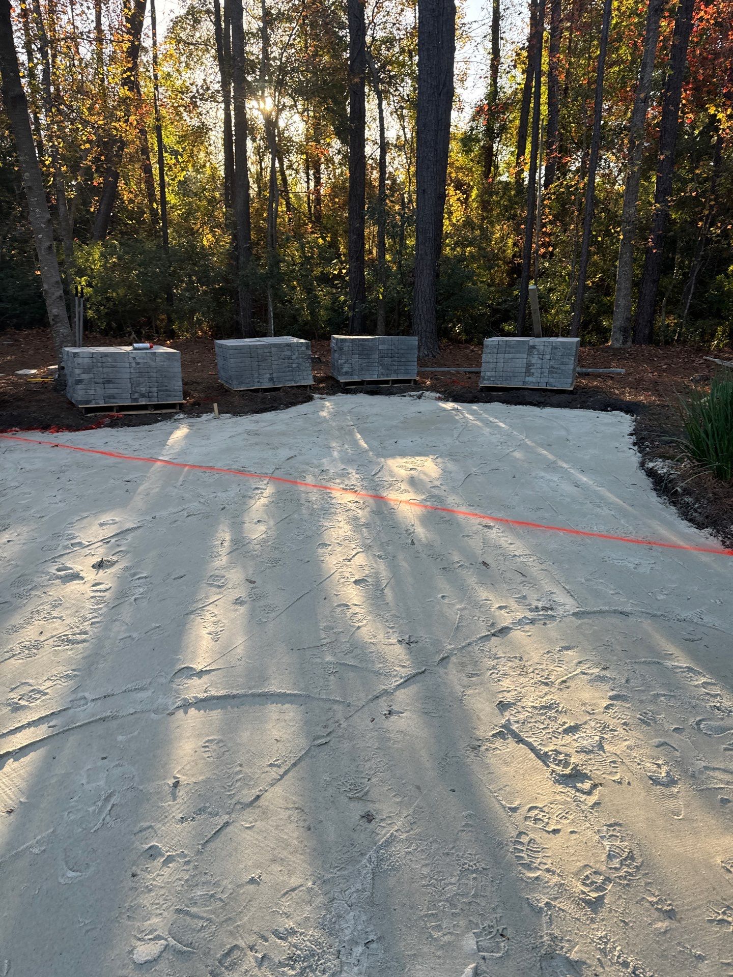 Custom Paver Driveway and Textured Pool Deck Installation in Hilton Head Island by Lowcountry Scapes, LLC