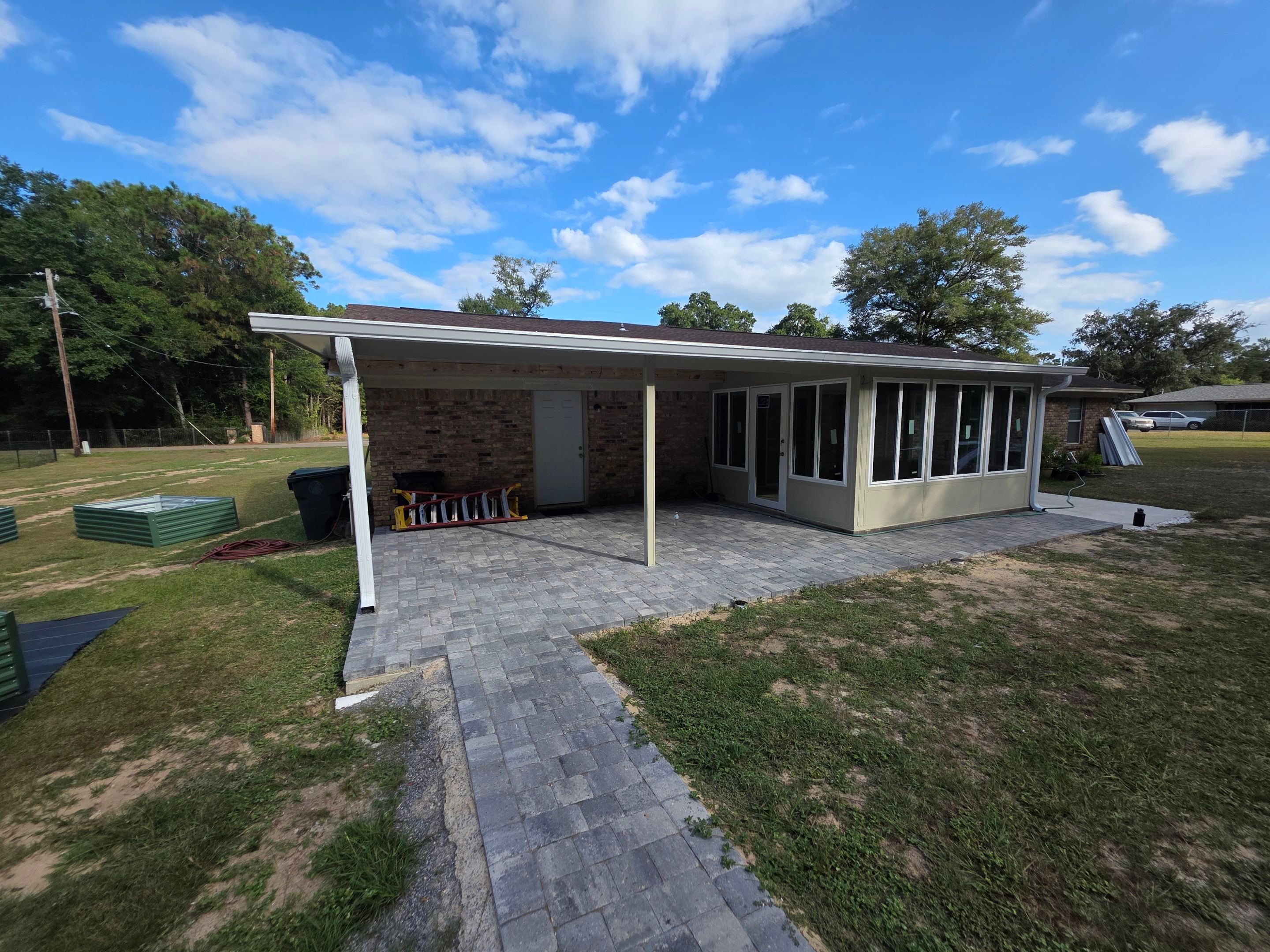 Sunroom Addition and Covered Patio by Titan Sunrooms