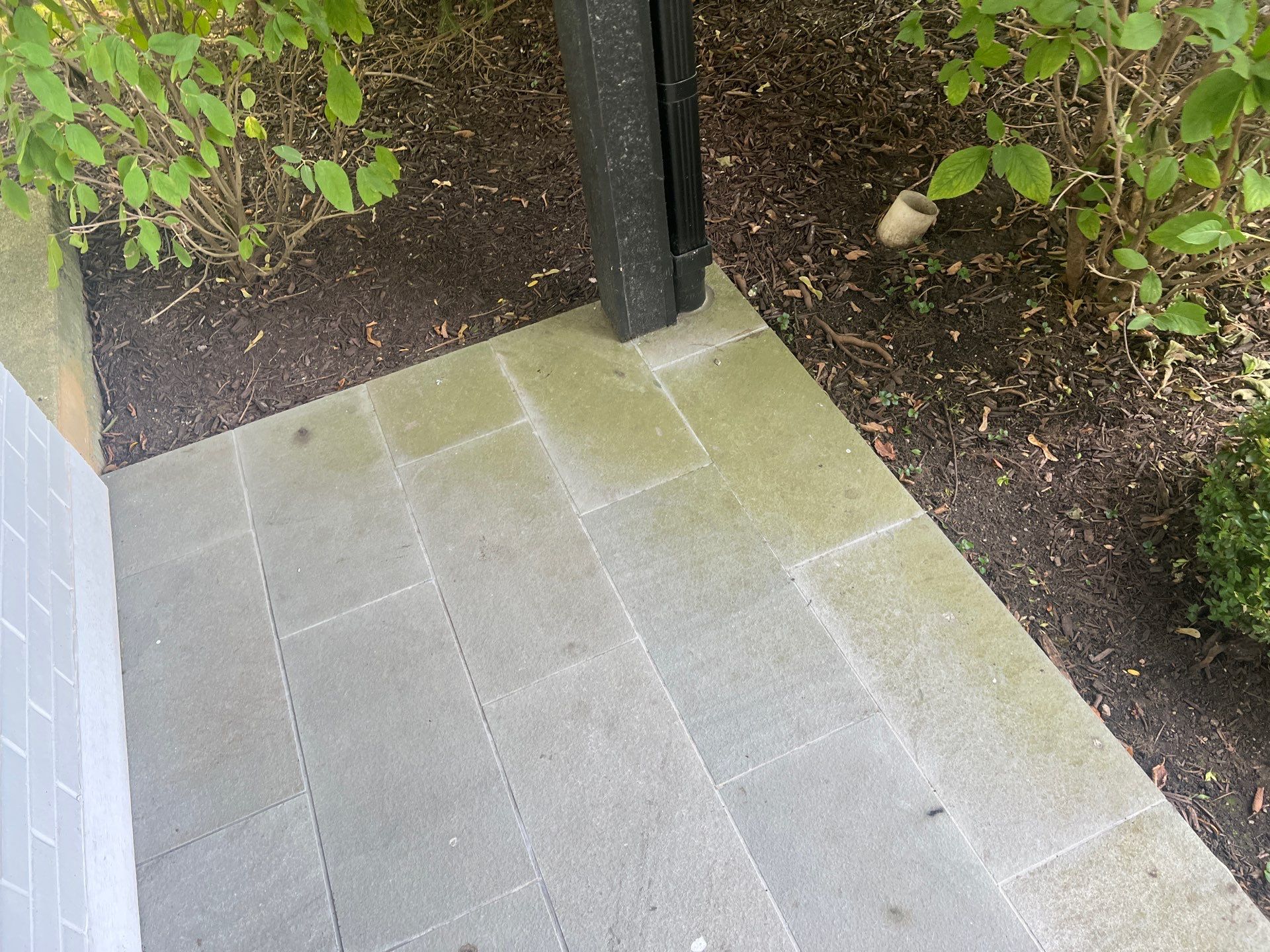 Complete Exterior House, Bluestone & Garage Floor Cleaning by Northern Power Washing LLC.