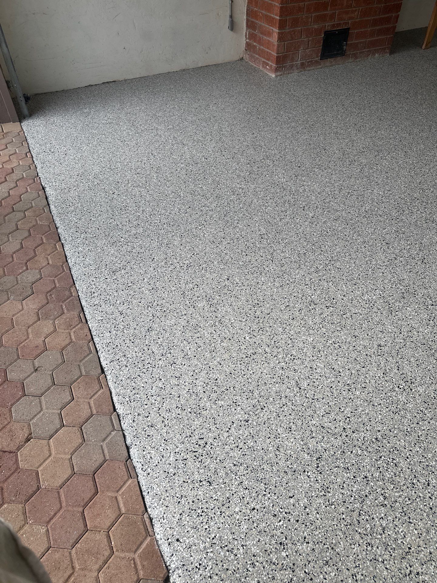 Polyurea Garage Floor Coating with Cabin Fever Decorative Chips in Cambria by MGP Coatings
