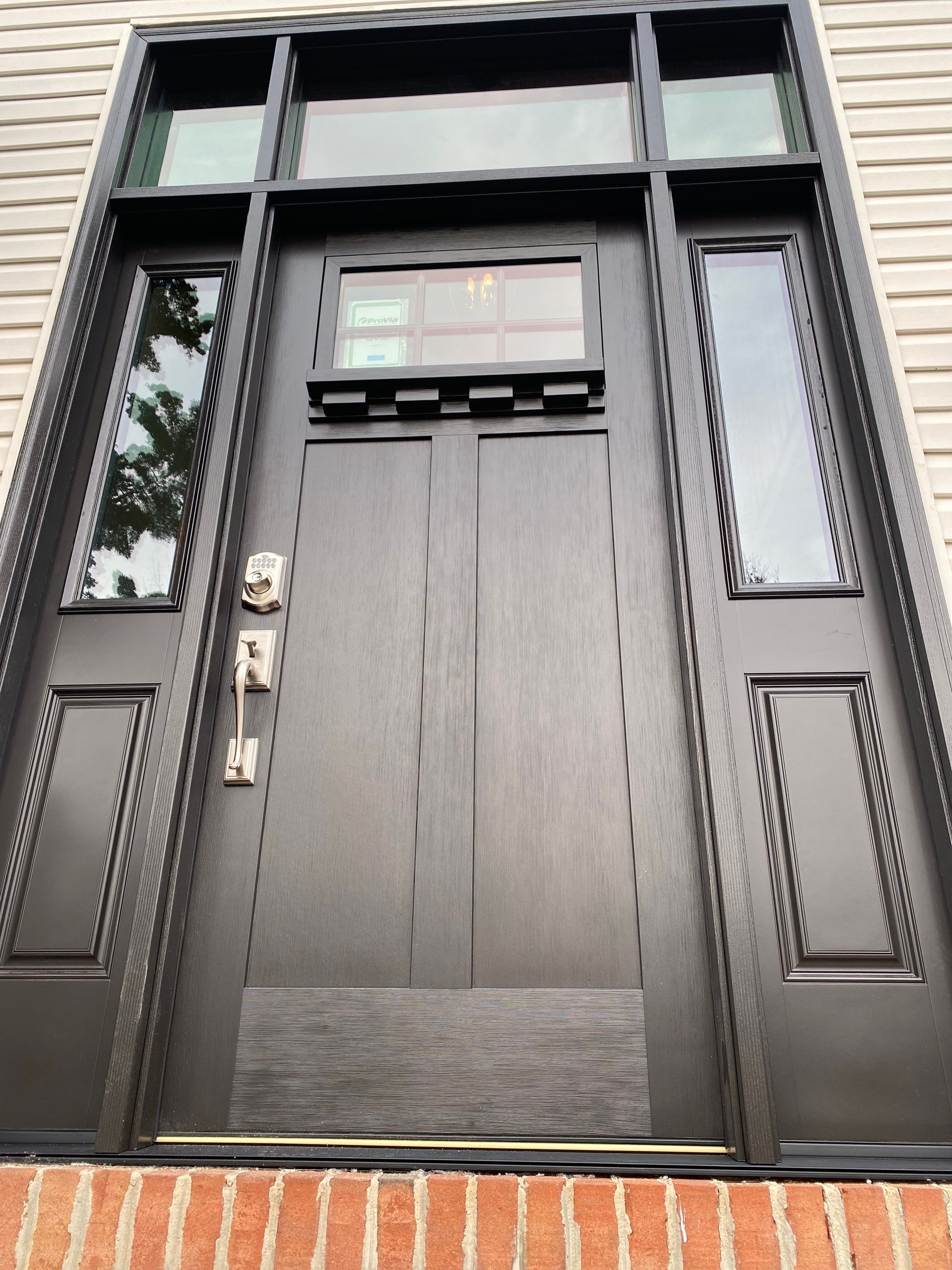 "🚪✨ Out with the old, in with the bold! Esh Builders just upgraded another customer's home to a custom Signet Entry Door by Provia MFG, blending style and durability right at your doorstep. #NewBeginnings #EshBuilders #HomeSweetHome 🏡💖" by Esh Builders