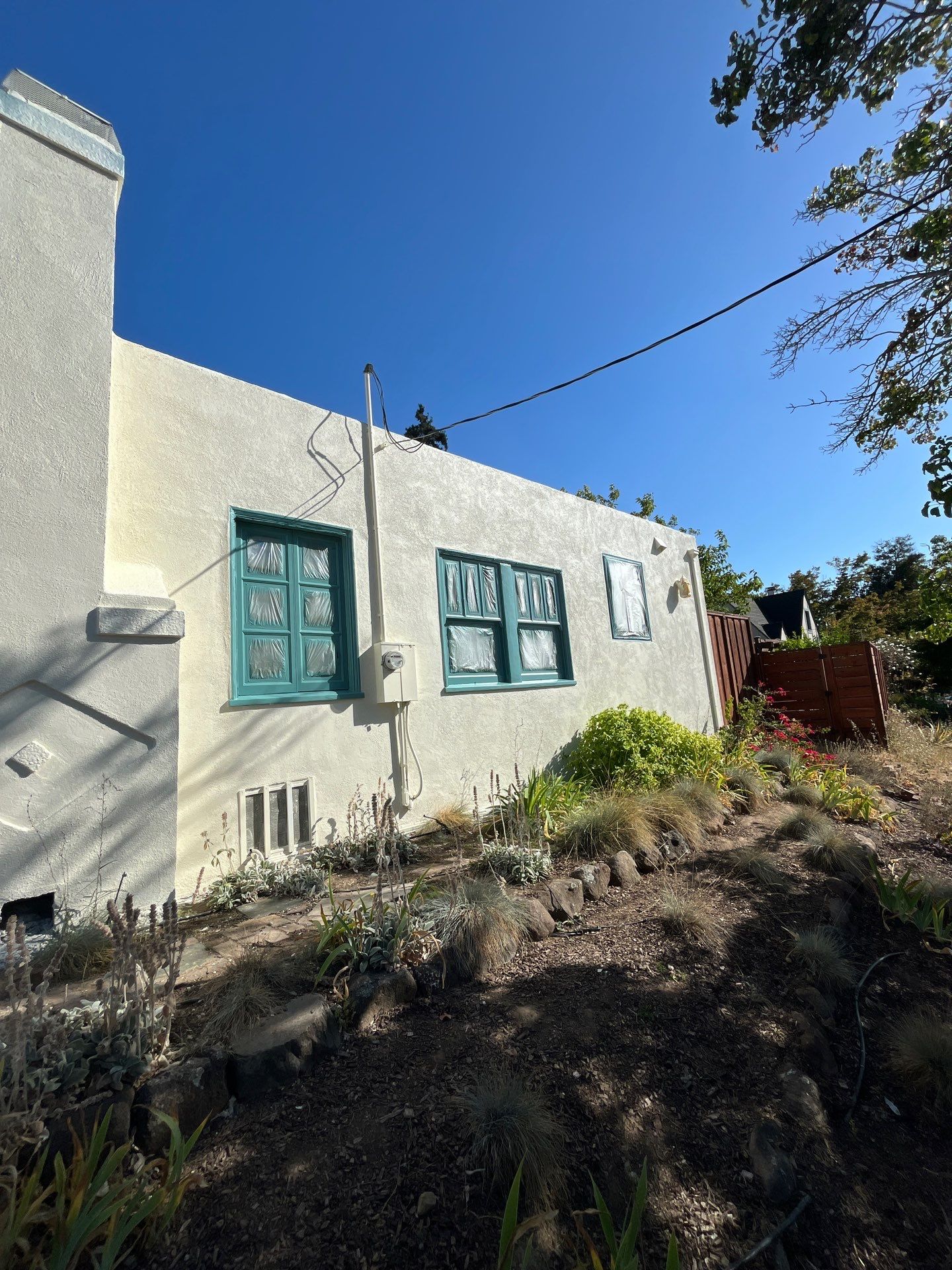 Exterior Transformation with Fresh Stucco and elastomeric system for waterproofing by Herrera’s Bay Area Painting inc.