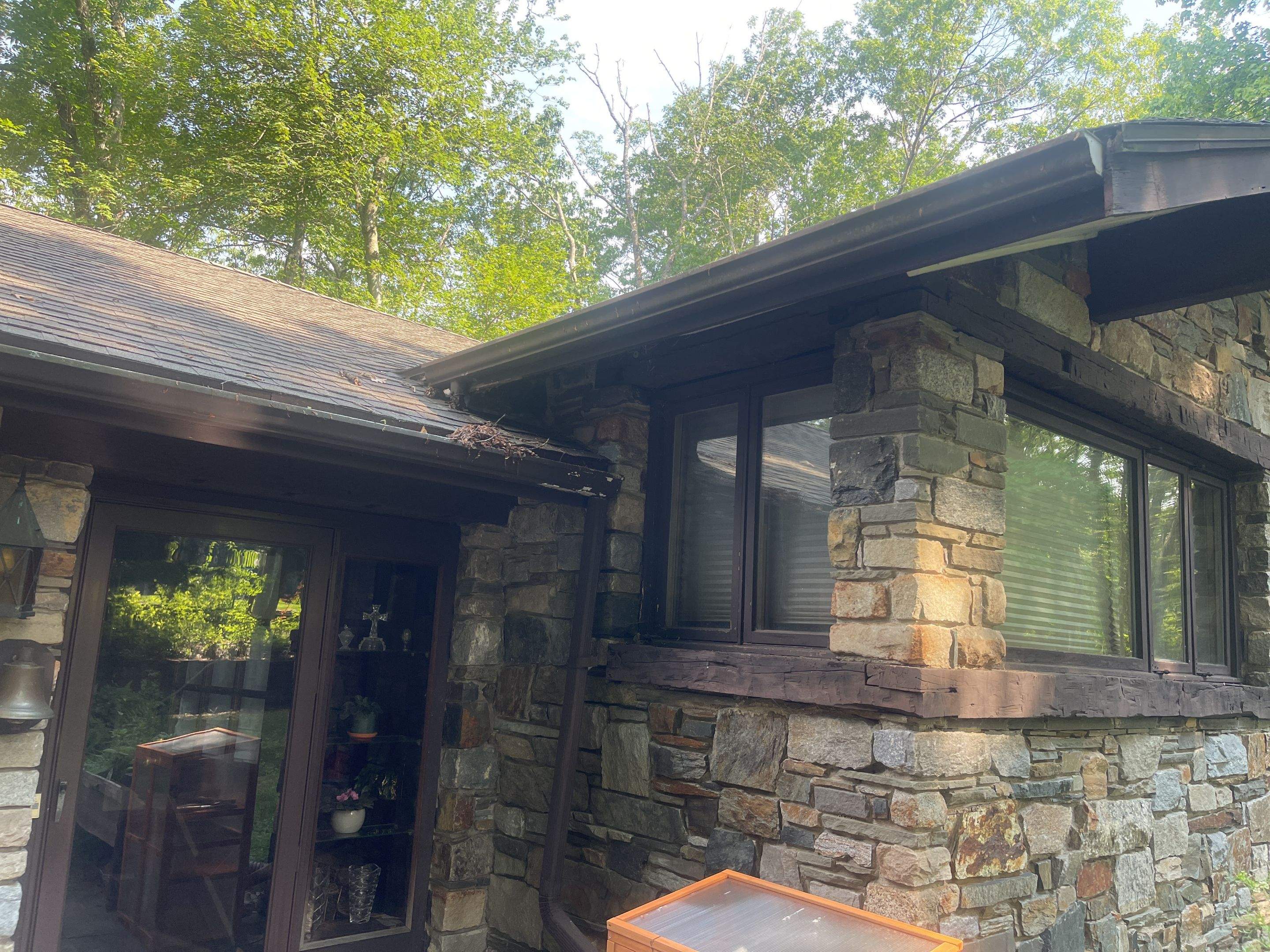 Gutter Installation using 5k Brown Gutters by A Plus Exterior