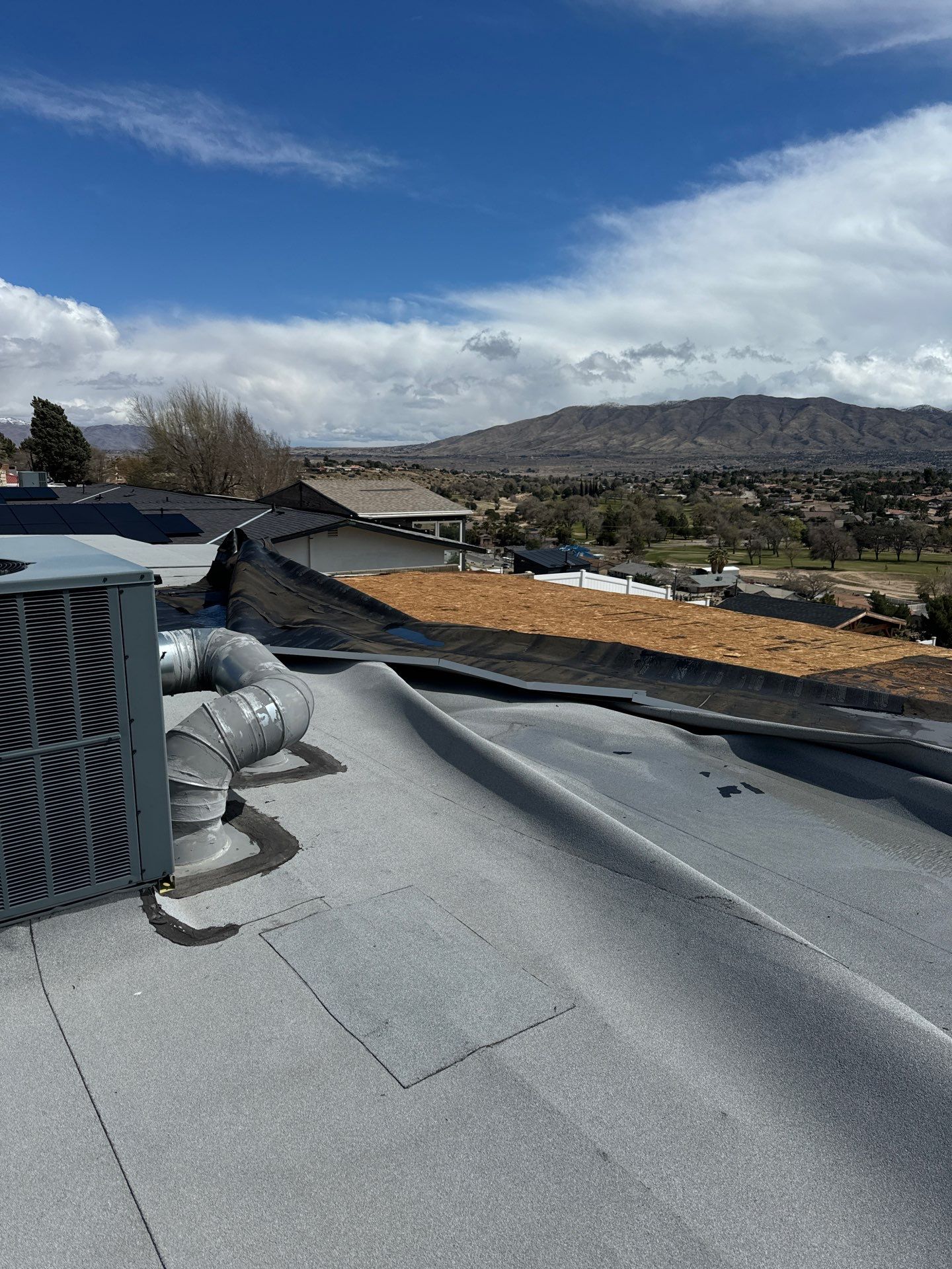 Storm took out this roof in Hesperia, CA by Innova Air & Heat