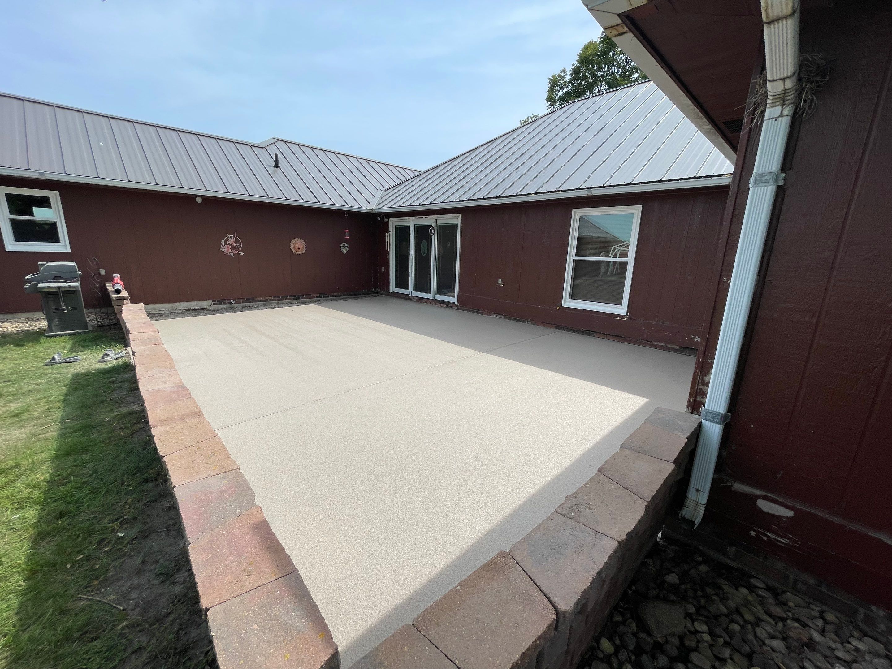 Concrete Patio Resurfacing and Protective Coating in Winfred, South Dakota by Select Painting, Coatings & Garage Cabinets
