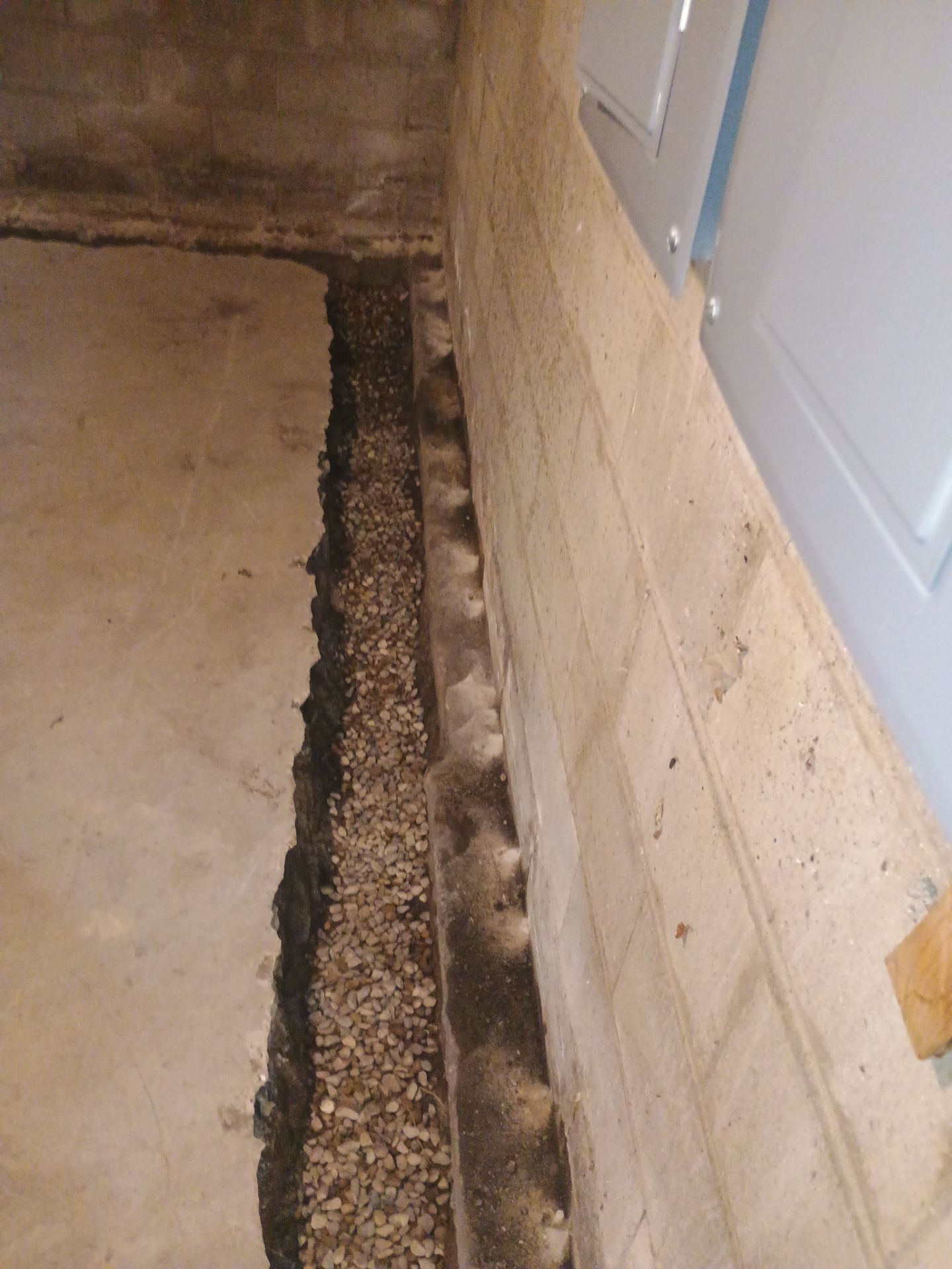 Interior Drain Tile & Buried Discharge in South Minneapolis by Waterproofing Northeast