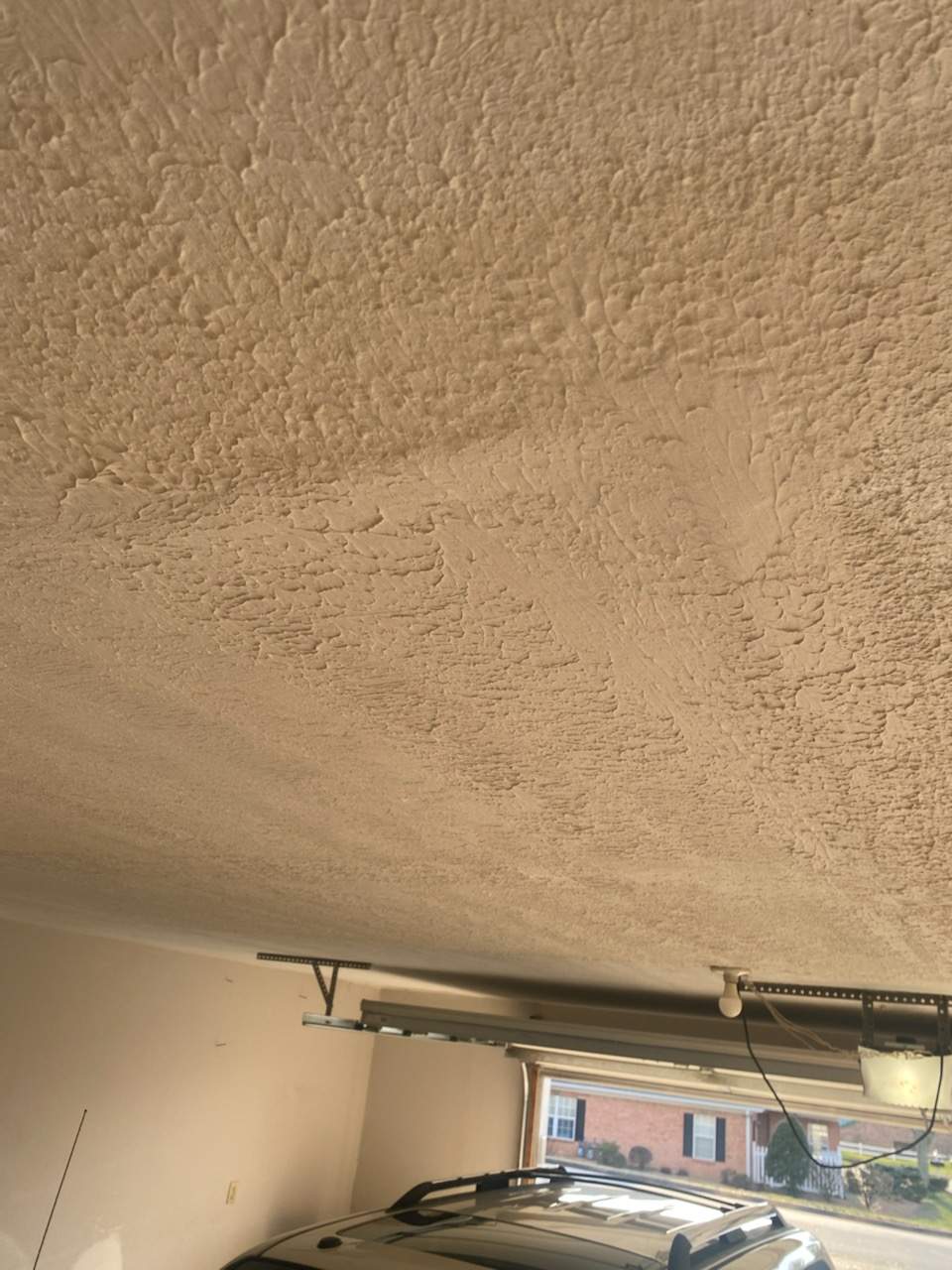 Interior Water Damage Affecting the Garage and Kitchen  by ANR Restoration