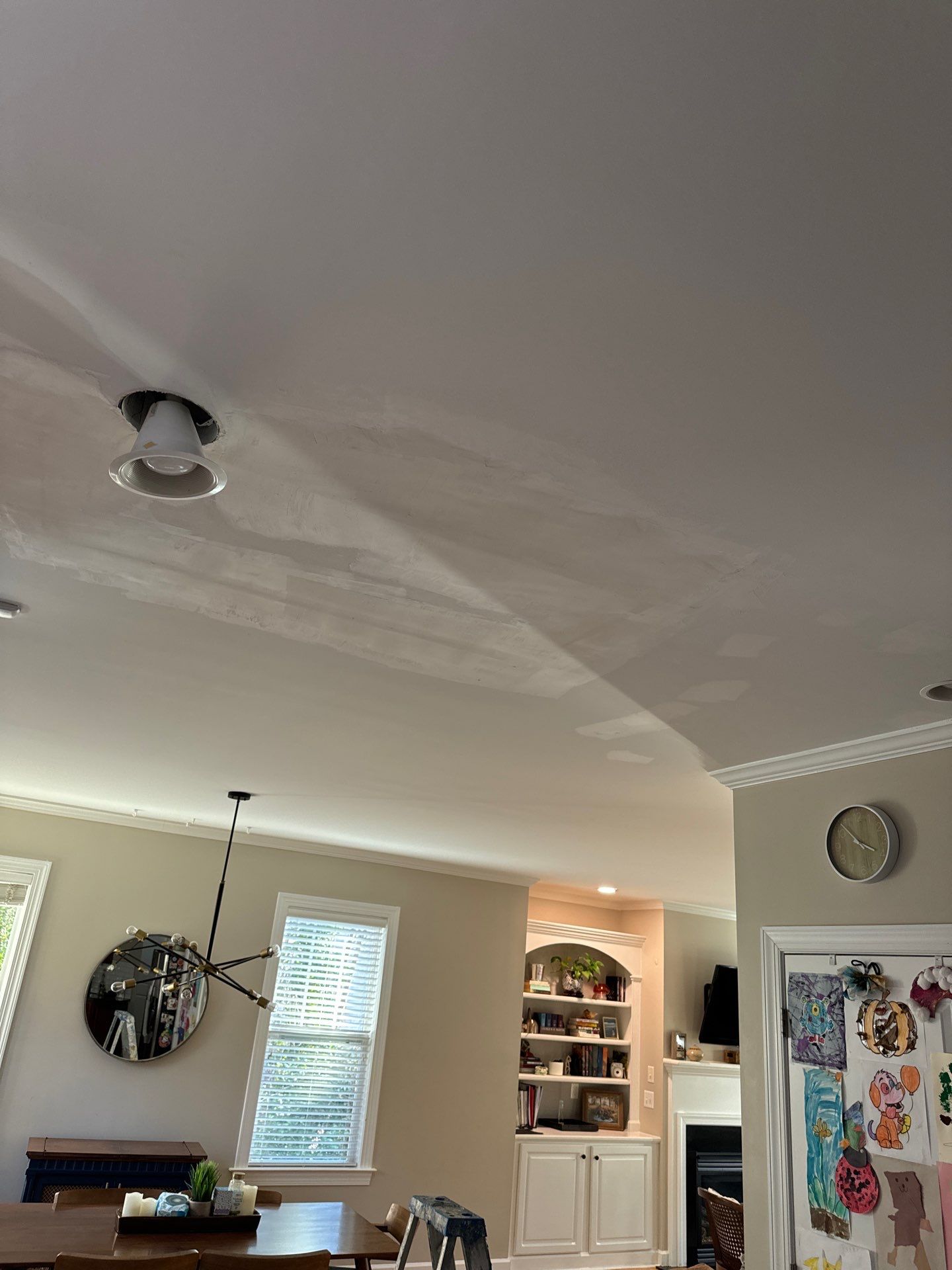 Drywall damage repair and repaint by GonzalezPainters & Contractors Inc 