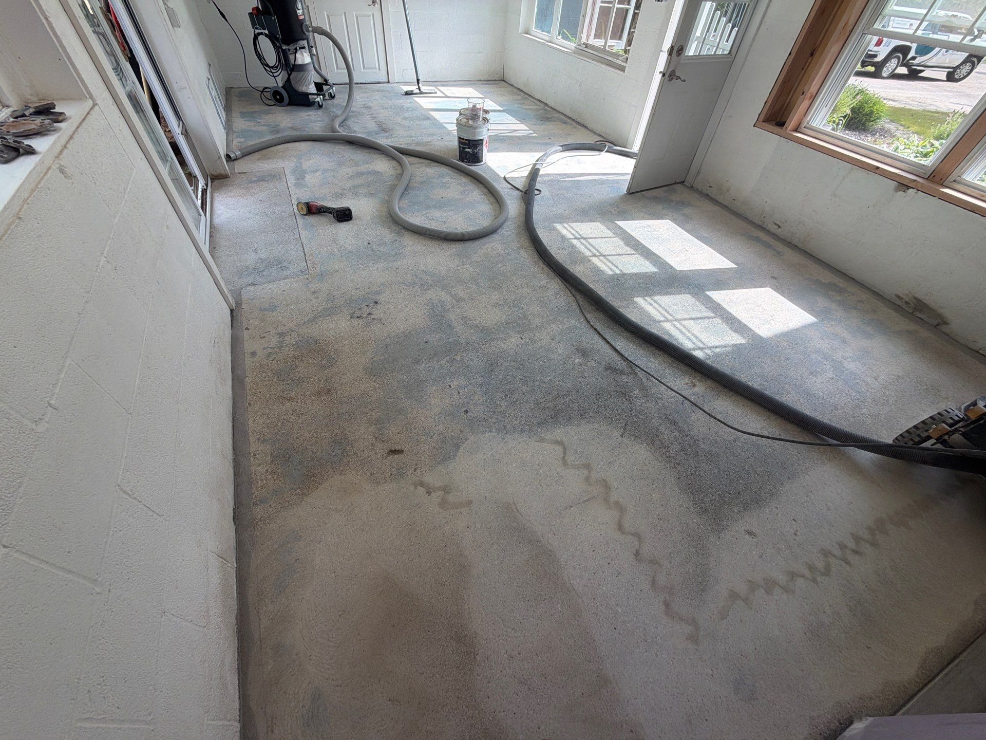 Grey Epoxy Flake Floor Installation for a Muskegon Sunroom by Gordon Painting