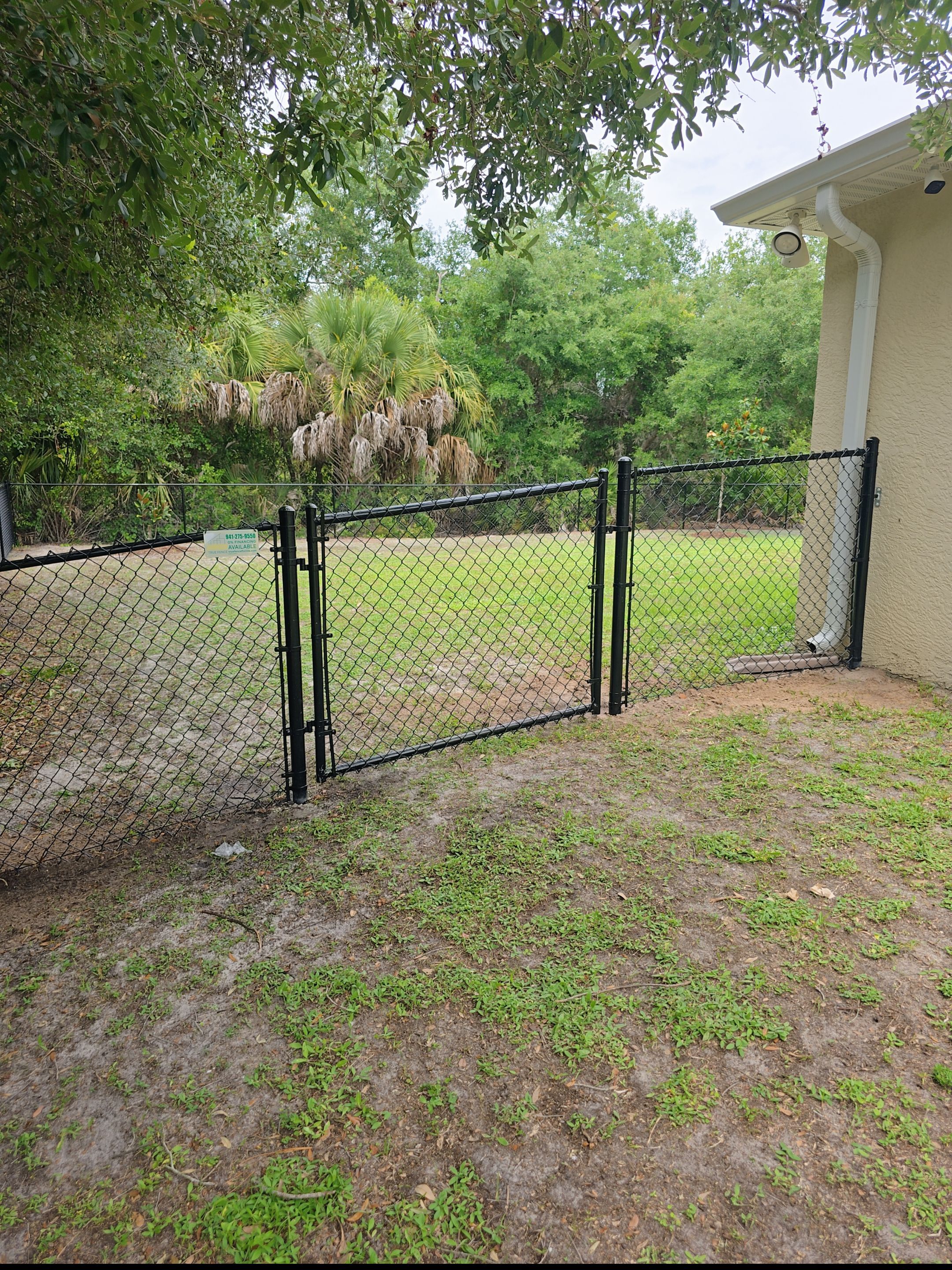 Residential Black Chain-Link Fence Installation in North Port by True Fence LLC