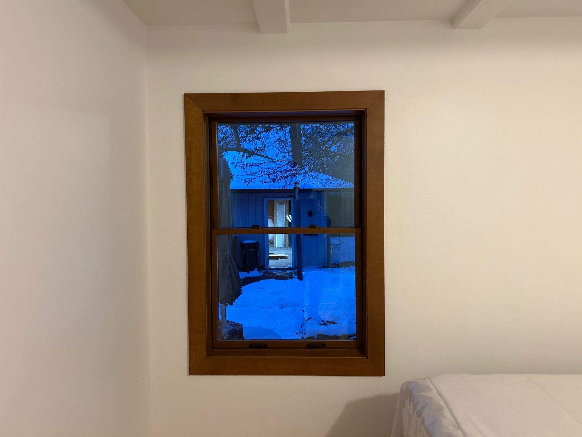 Black-Frame Pella Lifestyle Upgrade on a Partial Brick Home by United Windows and Siding LLC