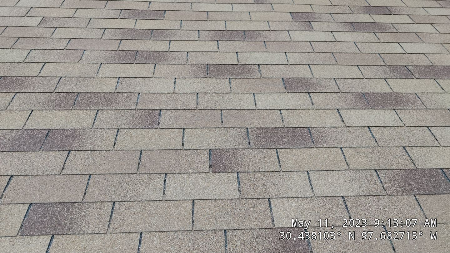 New Roof Installation Of IKO Dynasty Color Brownstone by DeZign Roofing & Exteriors