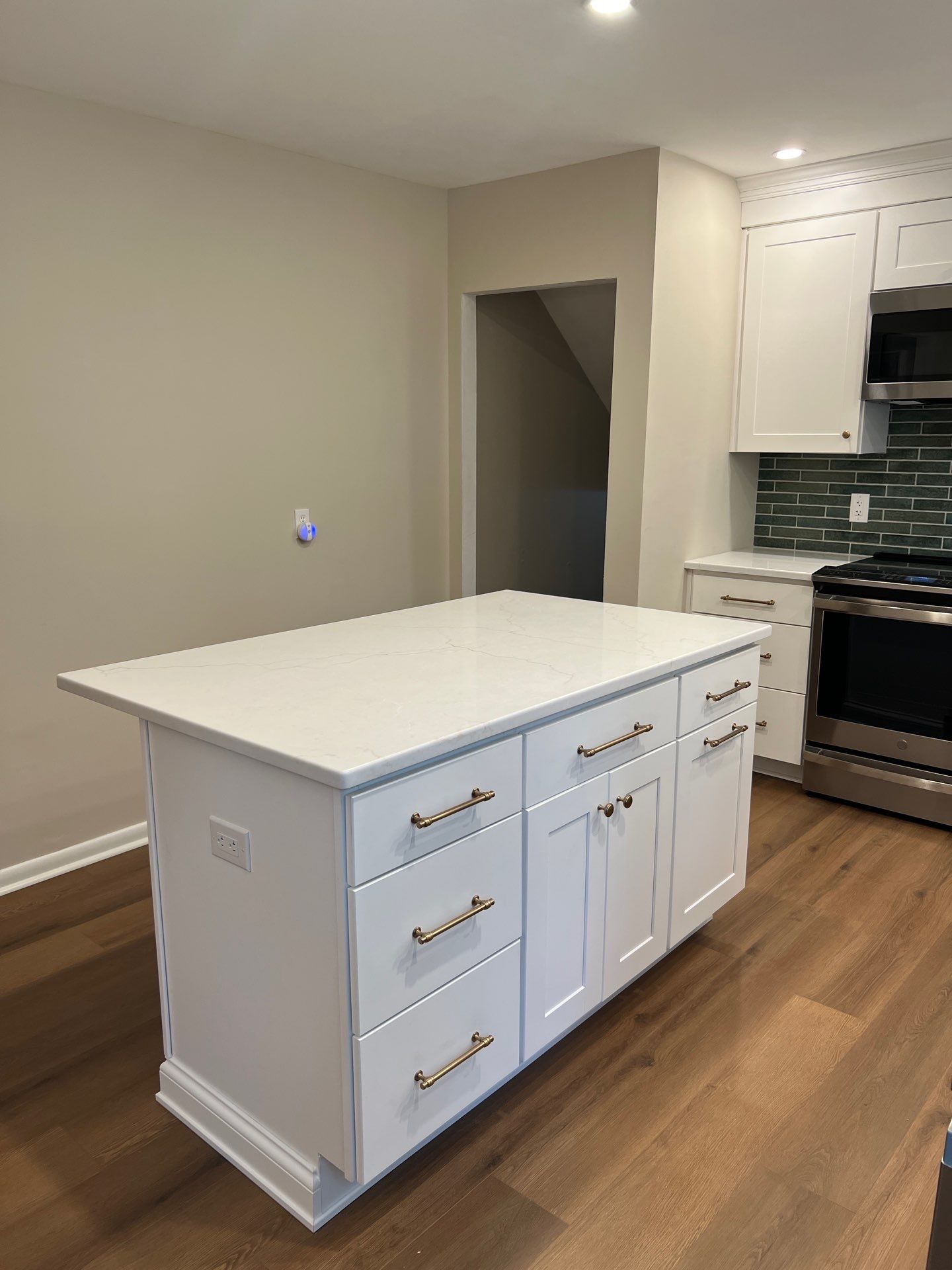 Phoenixville Kitchen Remodel with White Shaker Cabinets and Green Backsplash by Reliable General Contracting