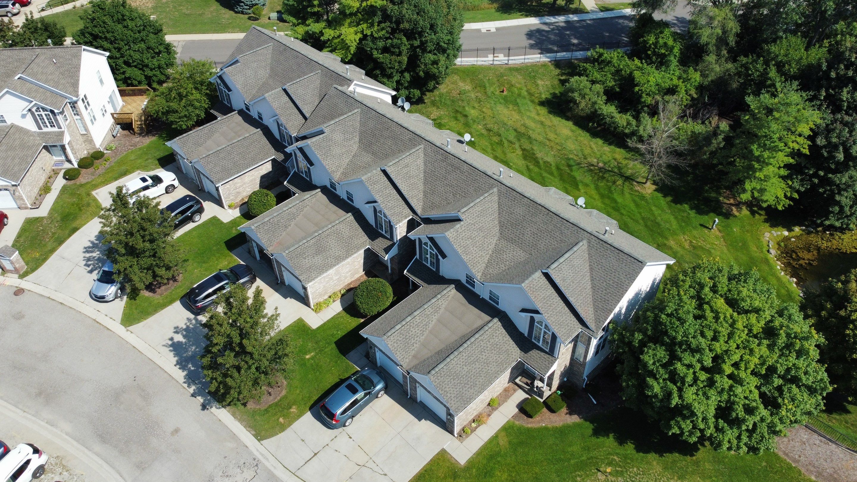 Roof Replacement and Proper Low Slope Installation - Condo Association  by Bloomfield Construction & Restoration