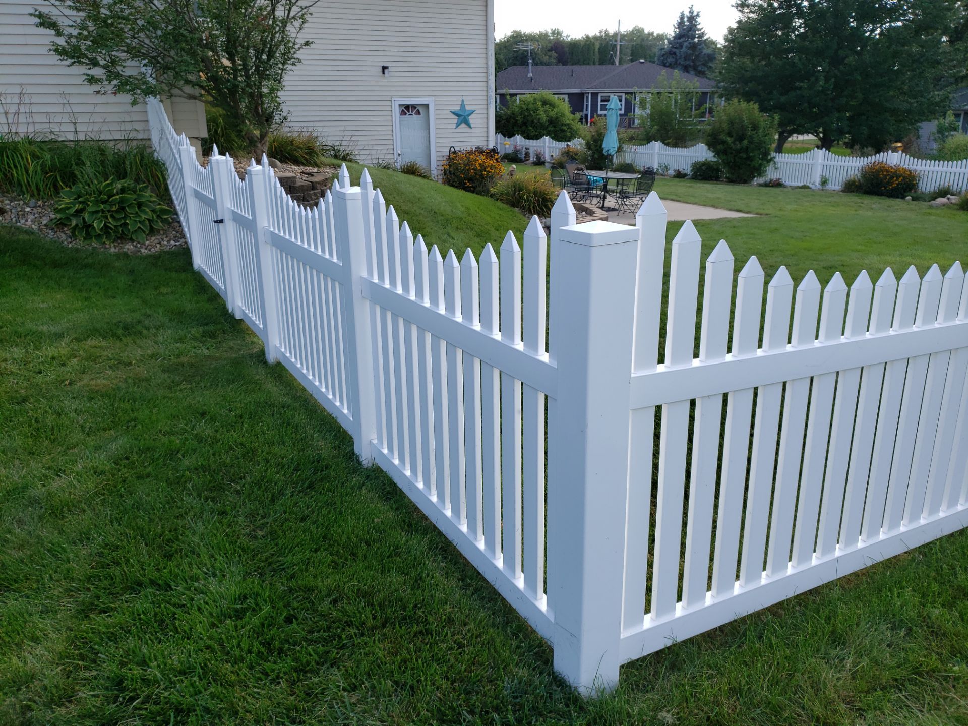 White Vinyl Spaced Picket Fence Installation in Waterloo by Perfect Picket Fence and Stain