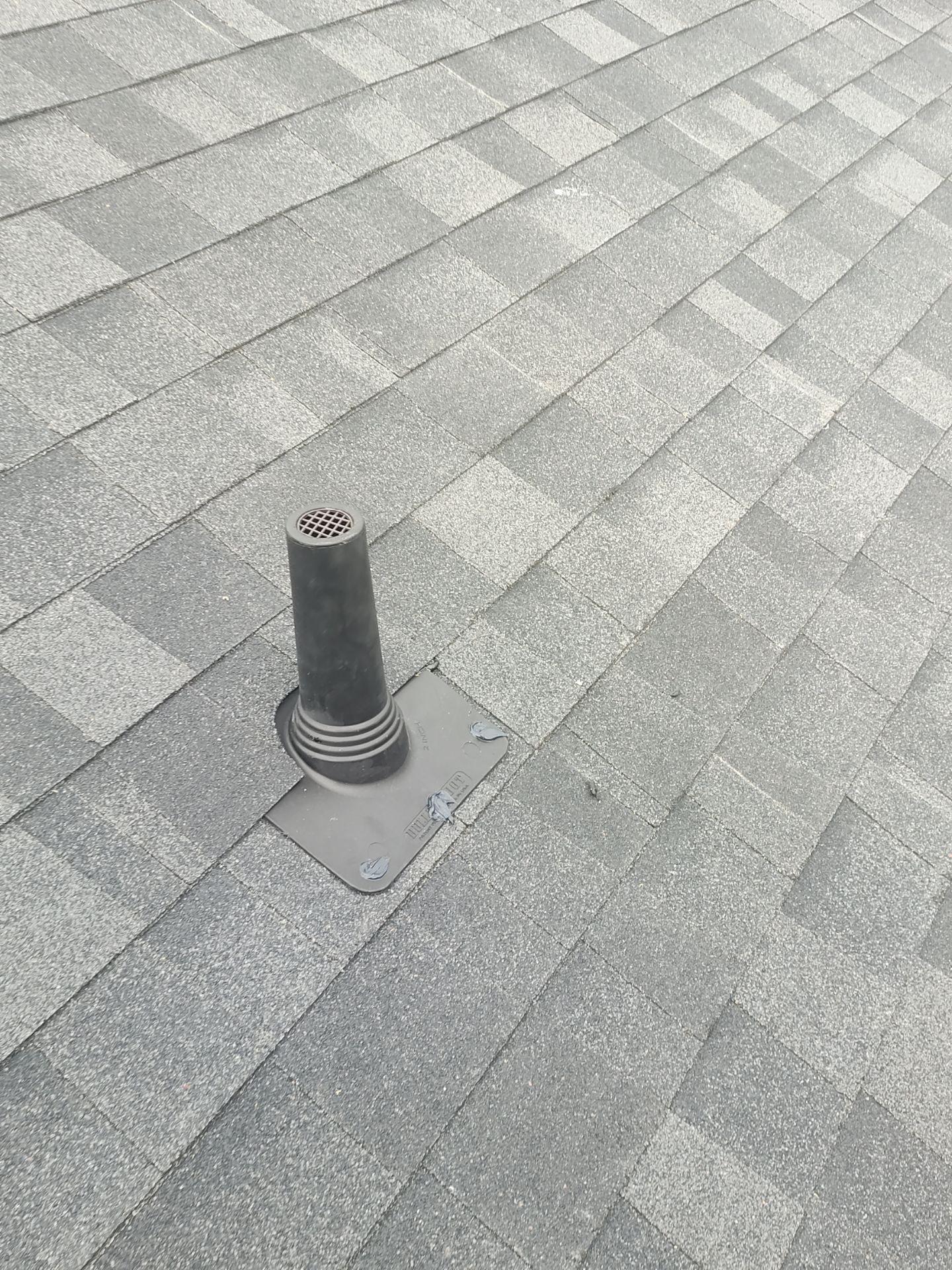 Nothing looks nicer than a little black roof by Bayfront Roofing and Construction