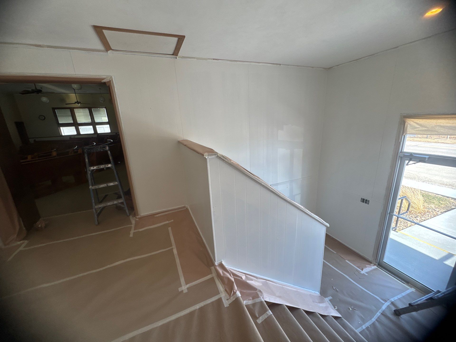 Interior Stairwell Transformation – Before & After by Midwest Paint LLC