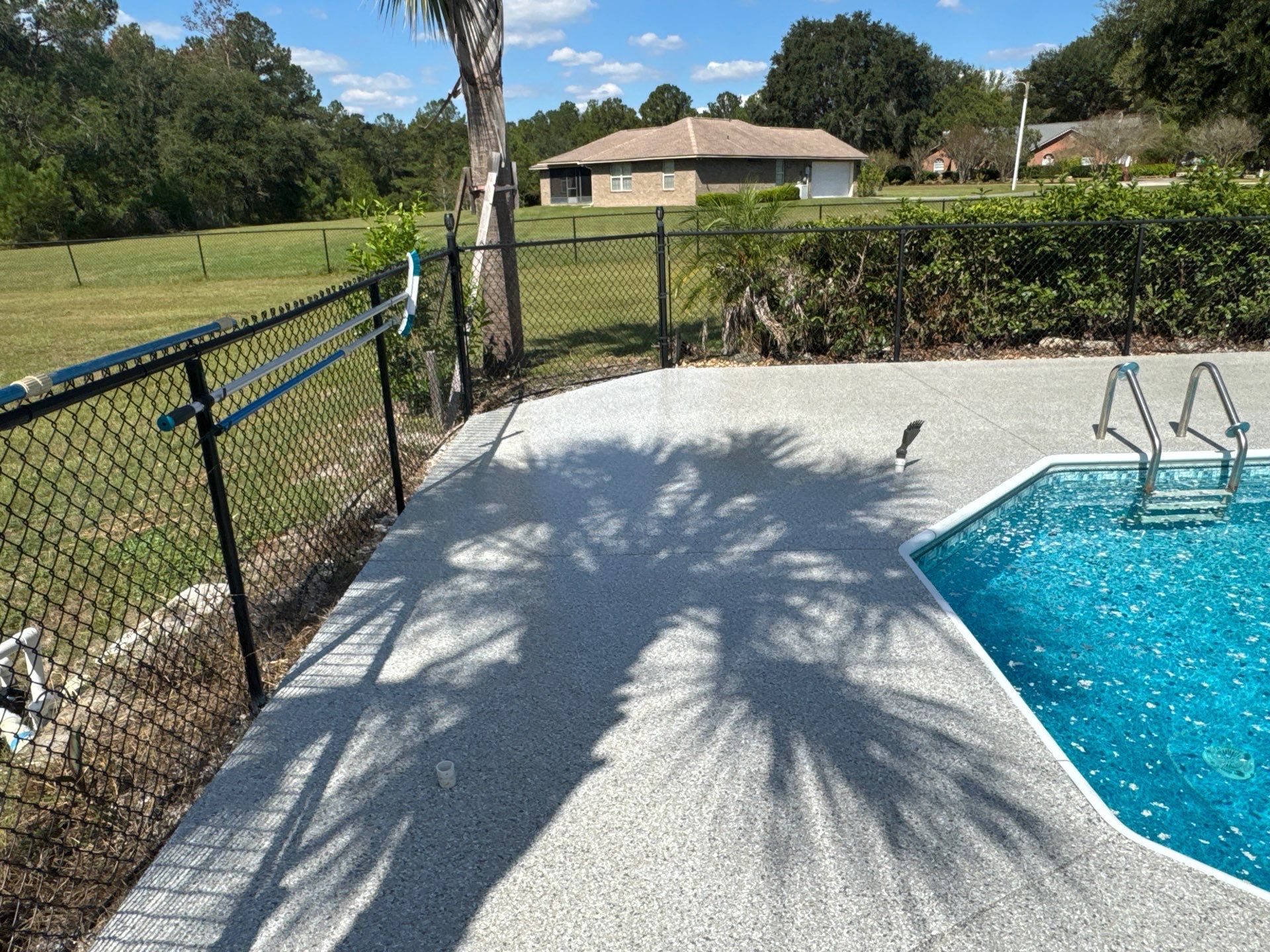 Pool Deck in Lake City, FL in Mount Everest by Cross Creek Concrete Coatings