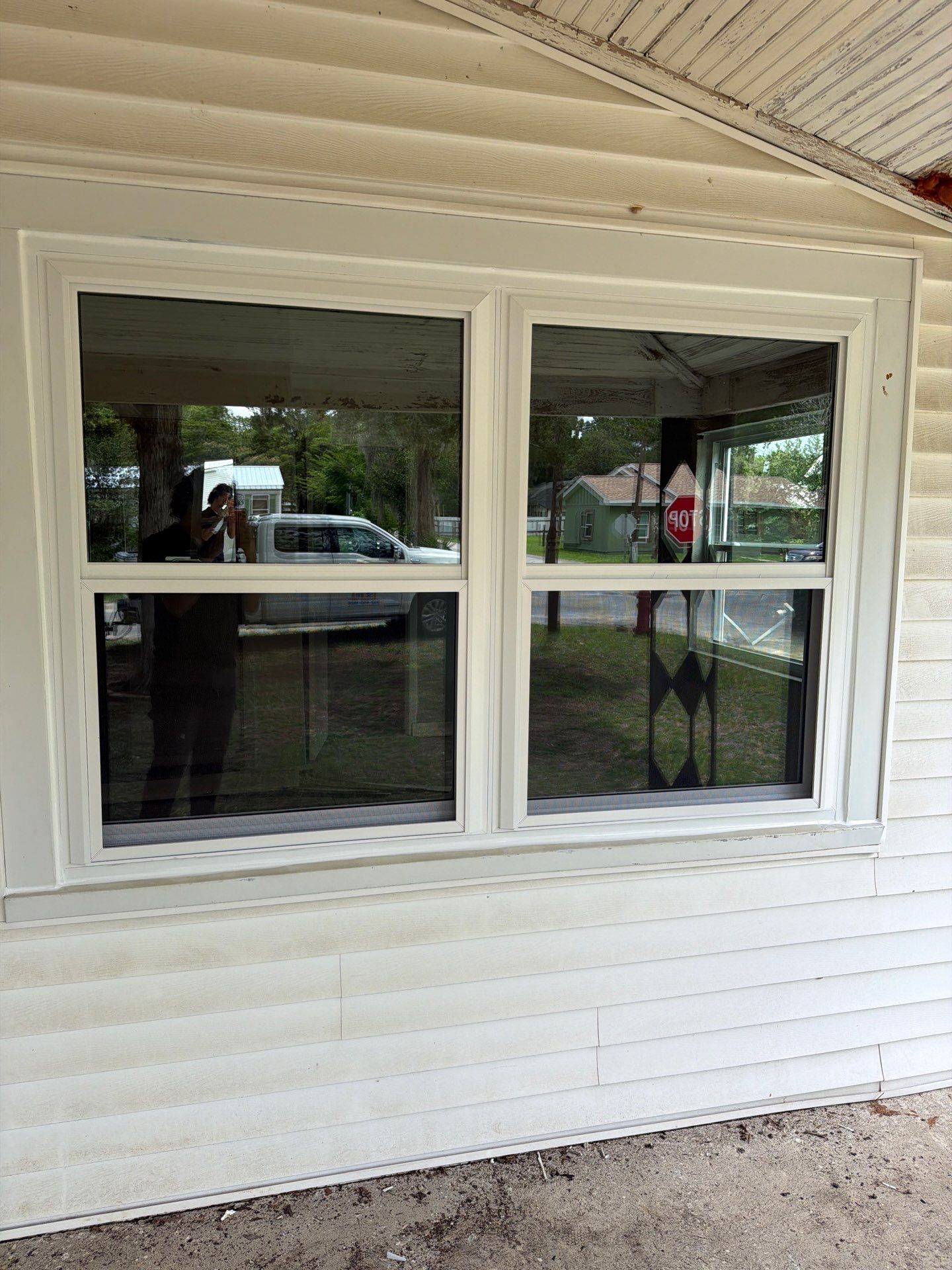 White Vinyl Window Replacement for Residential Home in Williston by Windows & Doors Store