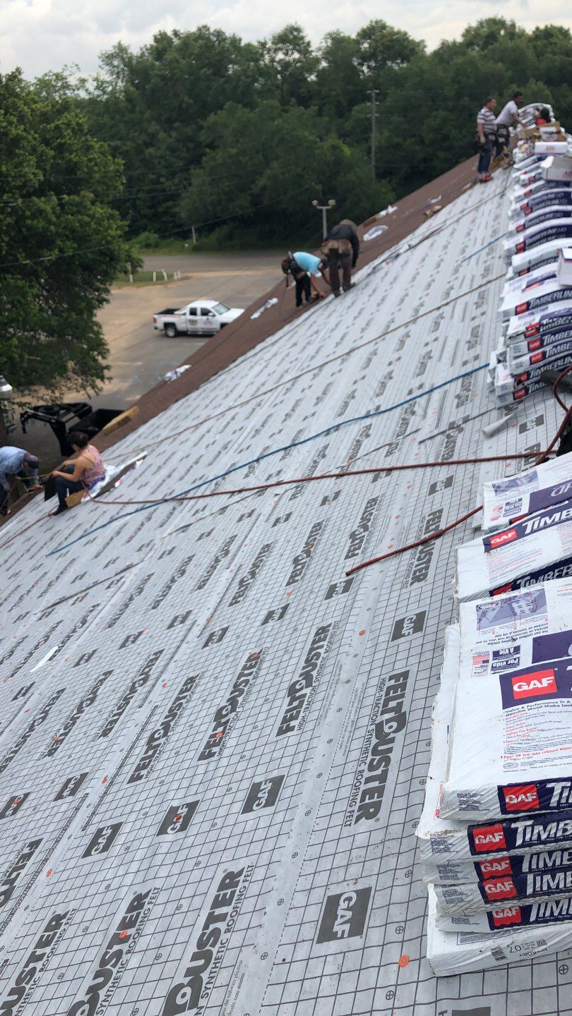 Residential Roofing Installation using Roof Replacement by American Roofing & Construction LLC
