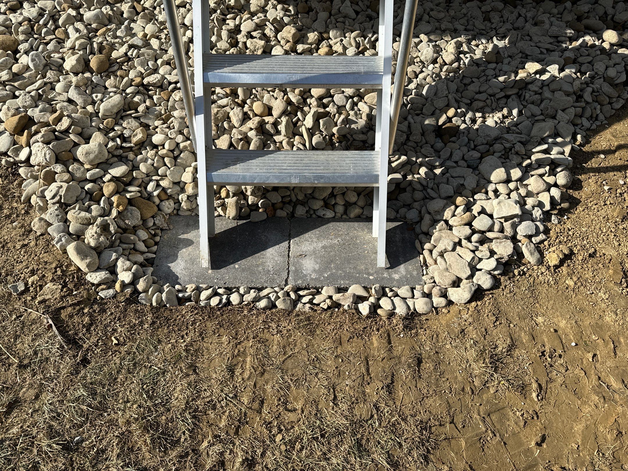 Pool Backfill, Grading, and Decorative Gravel Installation by Reisenberg’s Lawn & Landscape, LLC