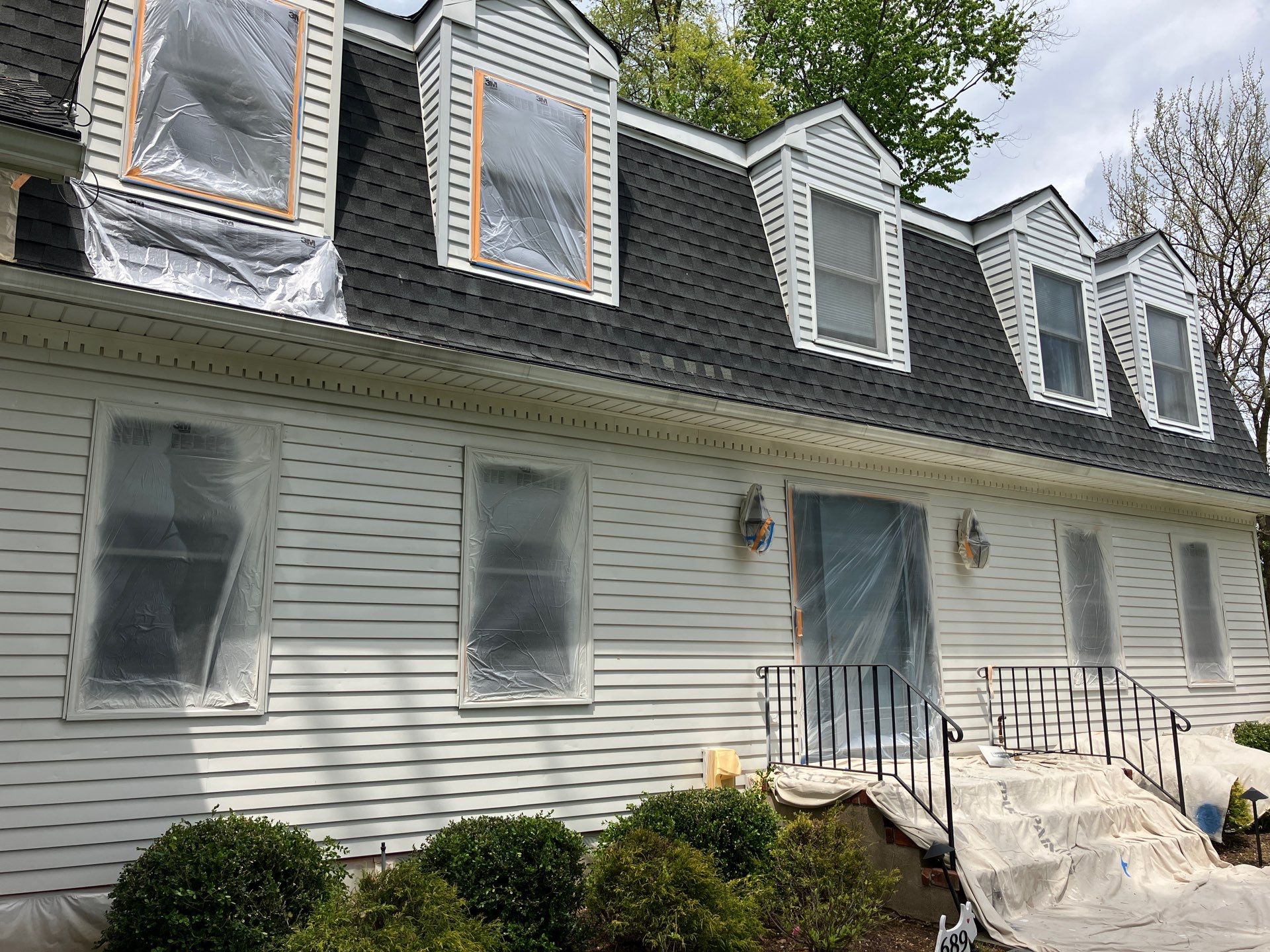 Exterior Home Painting and Garage Epoxy Floor Coating in Wyckoff by Spectrum Painting, LLC
