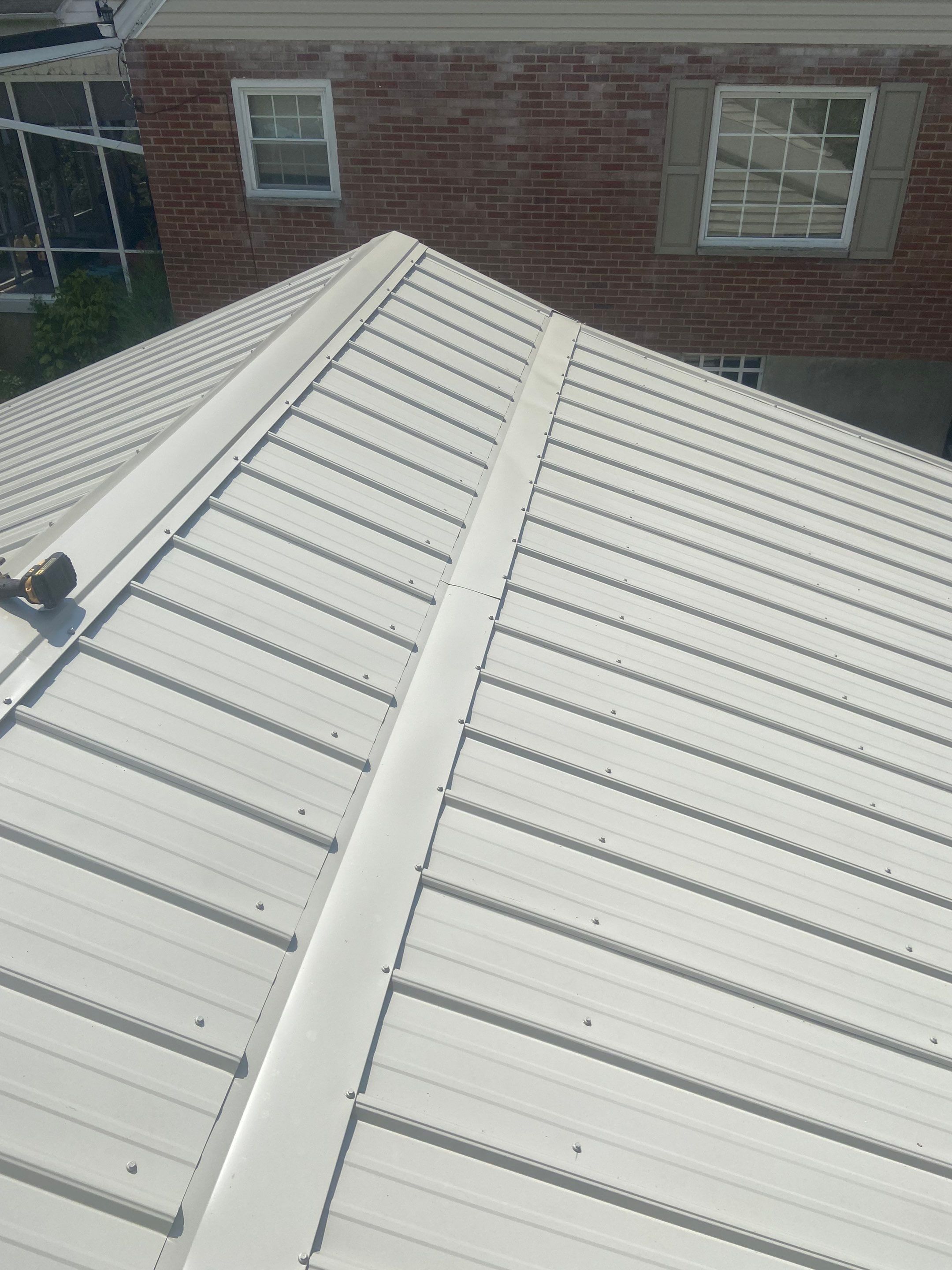 Metal Roofing, Skylights, Porch Build by Secure Construction Company Inc