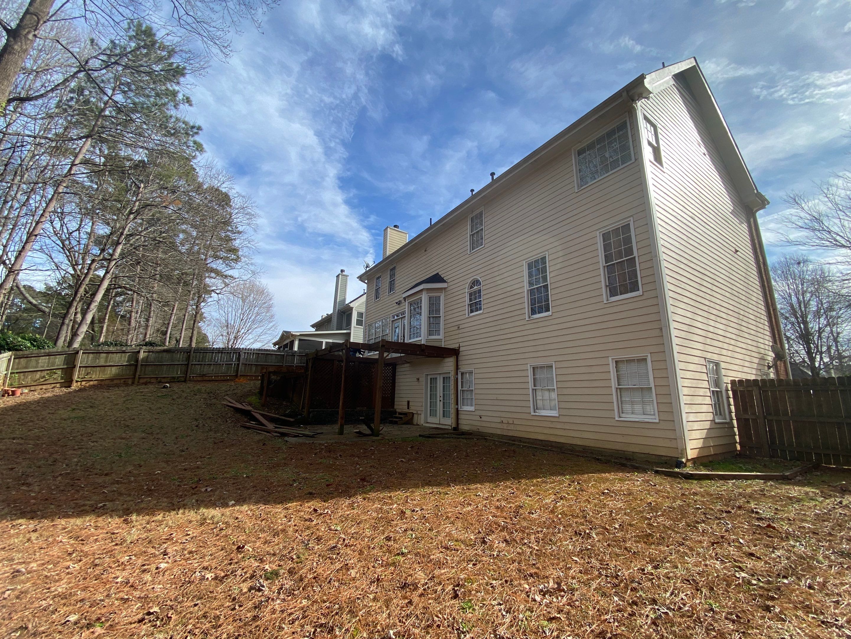 Elevated Pressure-Treated Wood Deck Replacement and Staircase in Duluth by Swift Home Renovations