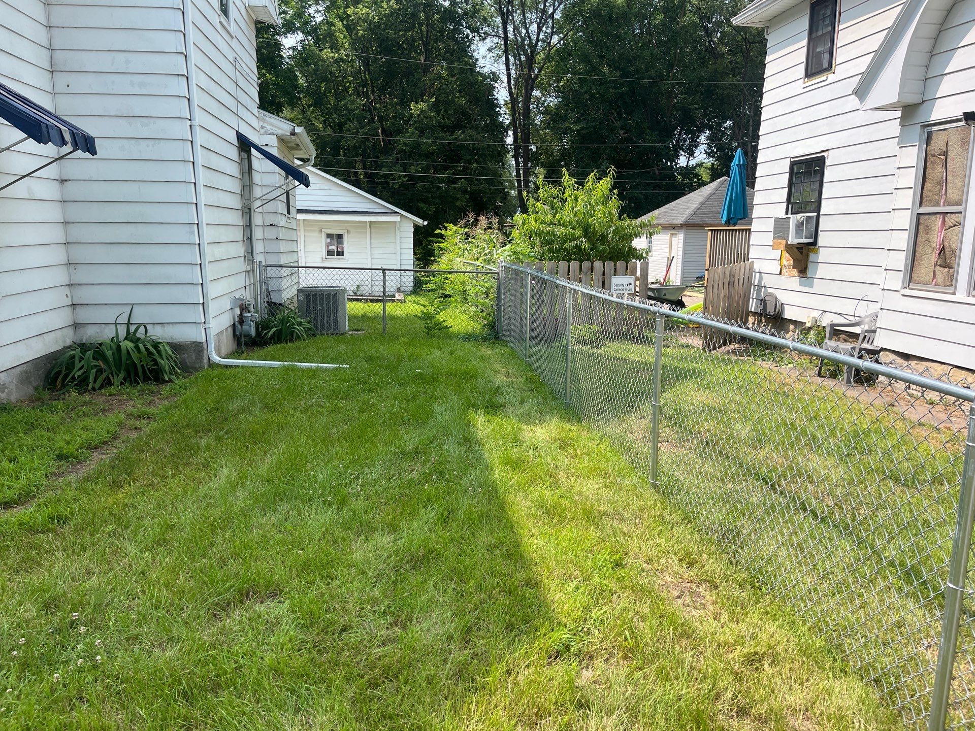 Galvanized Chain Link Perimeter Fence and Gate Installation in Waterloo by Perfect Picket Fence and Stain