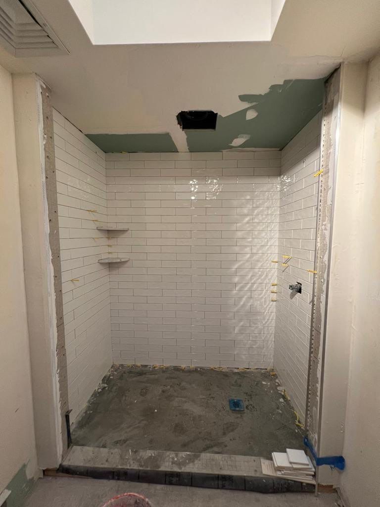 Bathroom Remodel using Tile by Home Concepts Construction