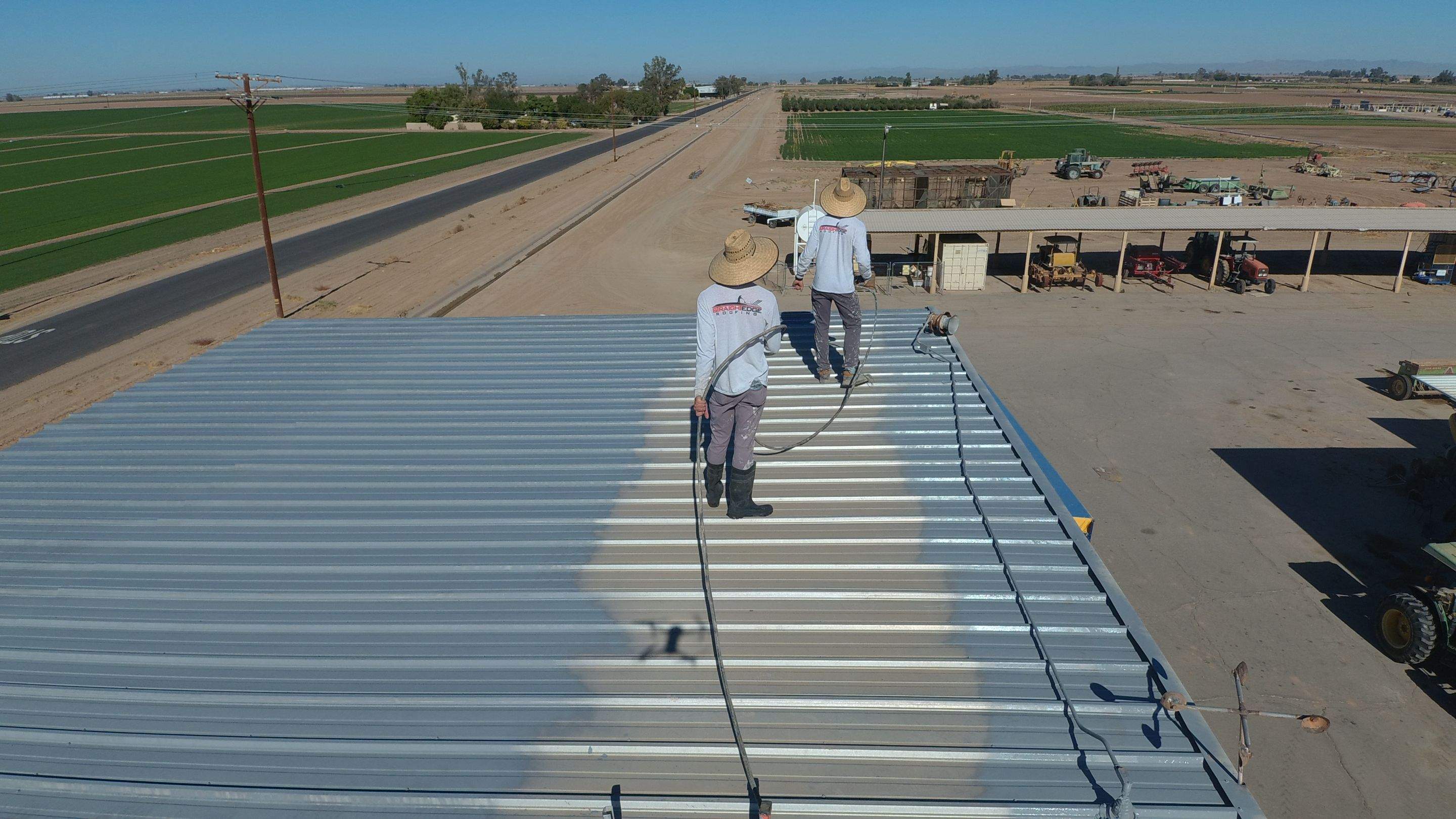 Metal roof restoration on commercial roof using Conklin Benchmark/PUMA XL fabric and coating by Straight Edge Roofing Inc