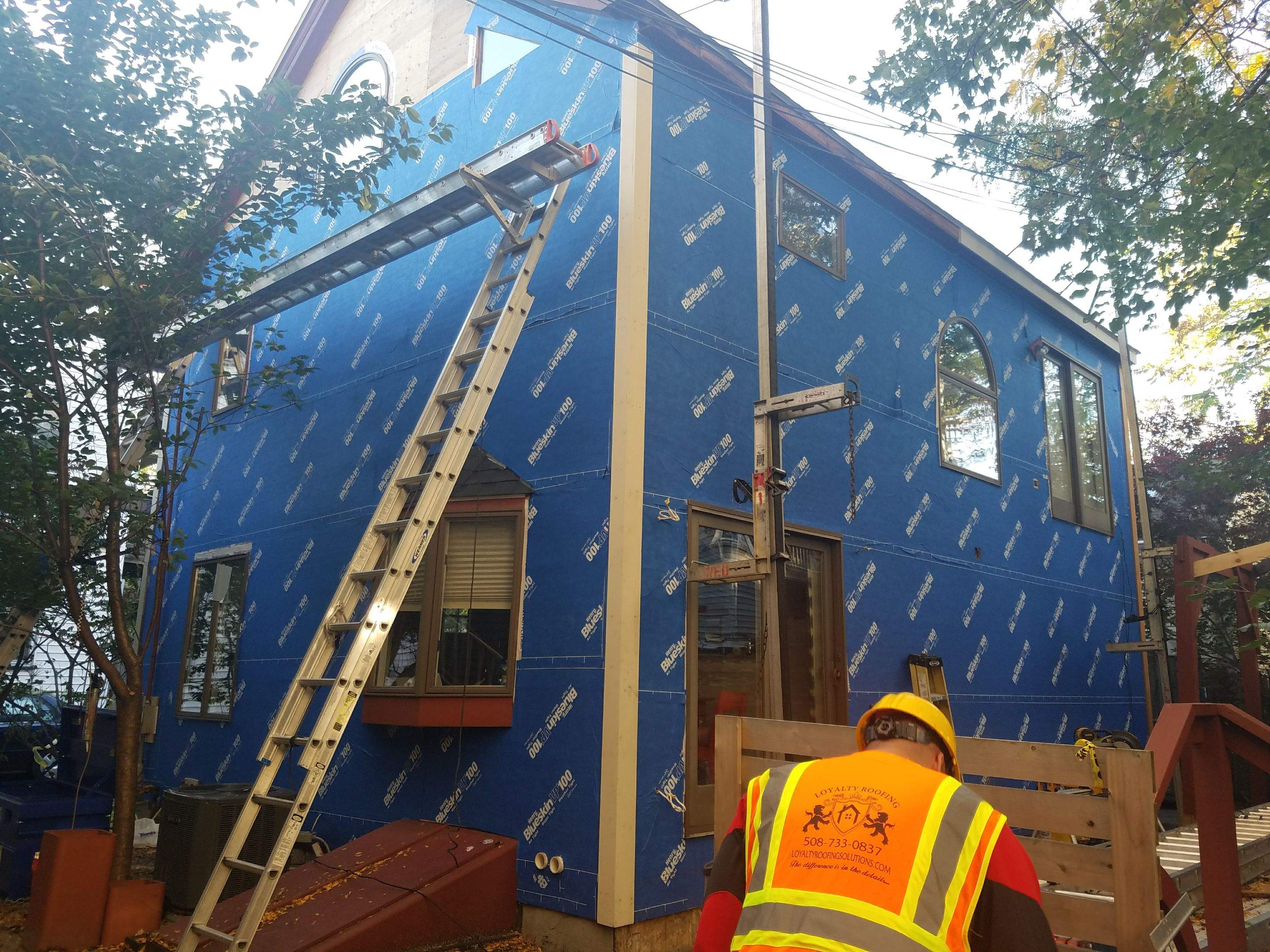 Siding Installation using Cedar Clapboard by Loyalty Exterior Solutions 