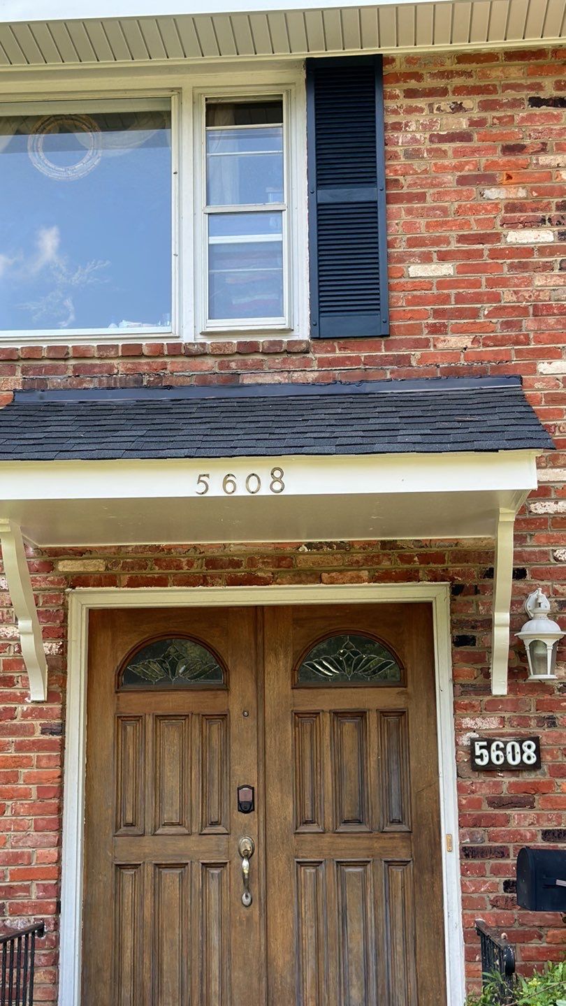 Springfield Tree Damage Restoration: CertainTeed Landmark Designer Shingles in Charcoal Black by RM Banning, Inc.