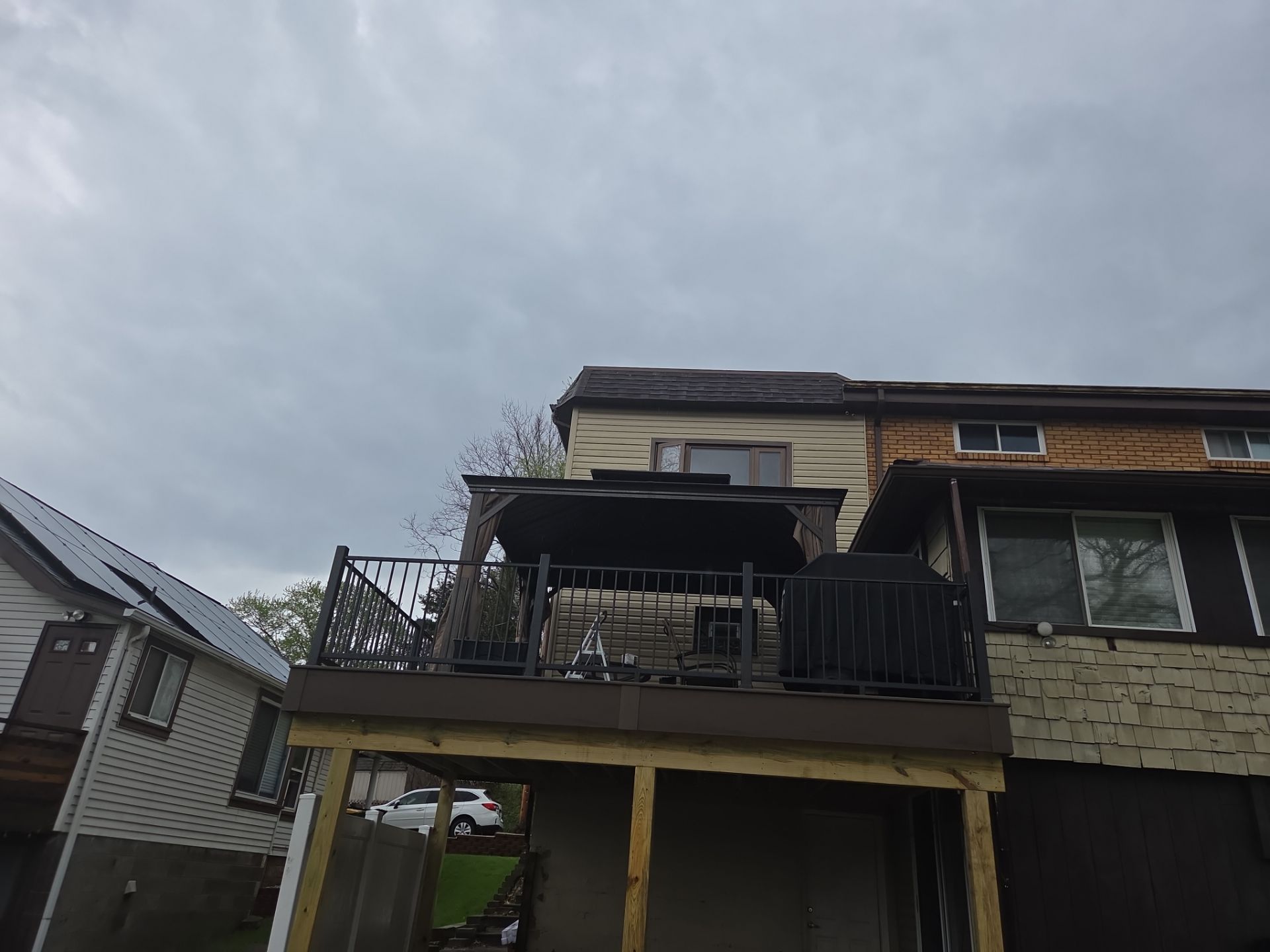 Custom Composite Deck and Wood-Plank Stamped Concrete Patio in Pittsburgh by Cousins Roofing Siding & Decks