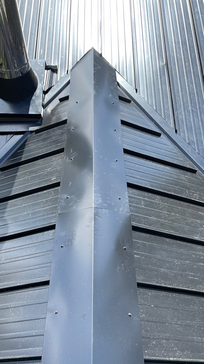 Residential ReRoofing Installation using 12" Prolok metal by Top Notch Roofing Inc