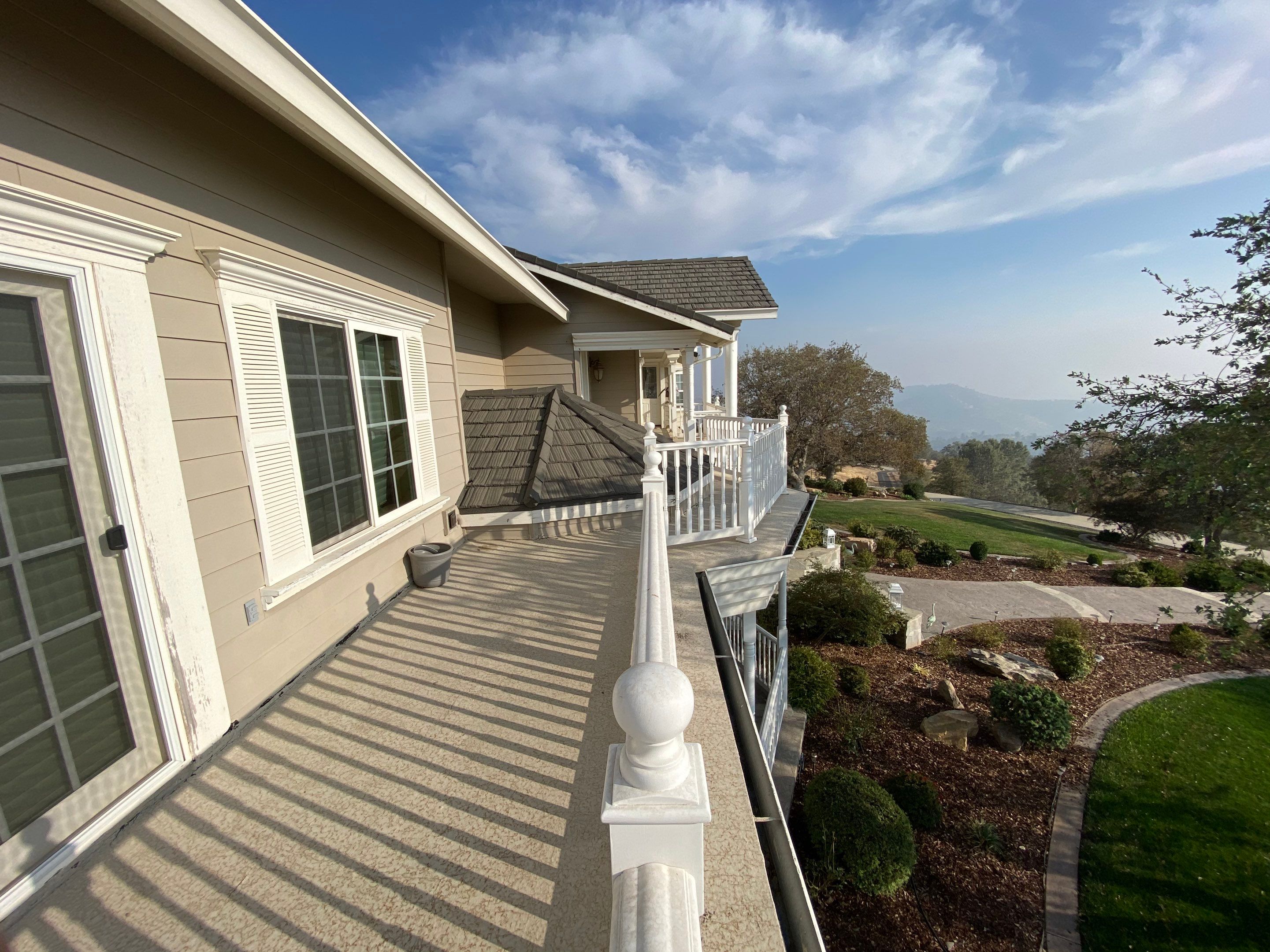 Sealant system over walk deck over house using Rubber coat and coatings by Straight Edge Roofing Inc