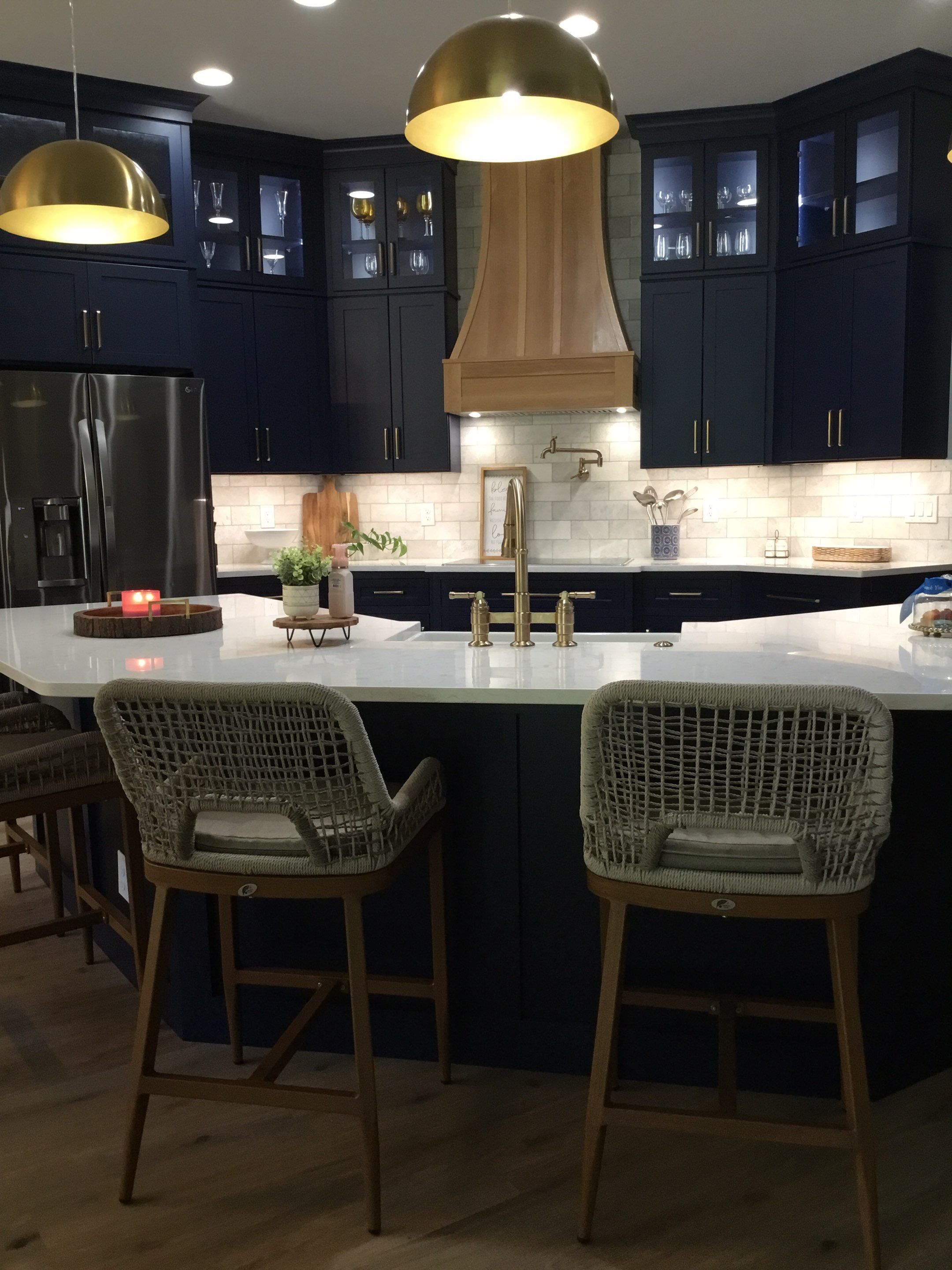 Spring Branch Kitchen Remodel | Custom Navy Cabinetry & Wood Range Hood by Legacy Bath and Kitchen