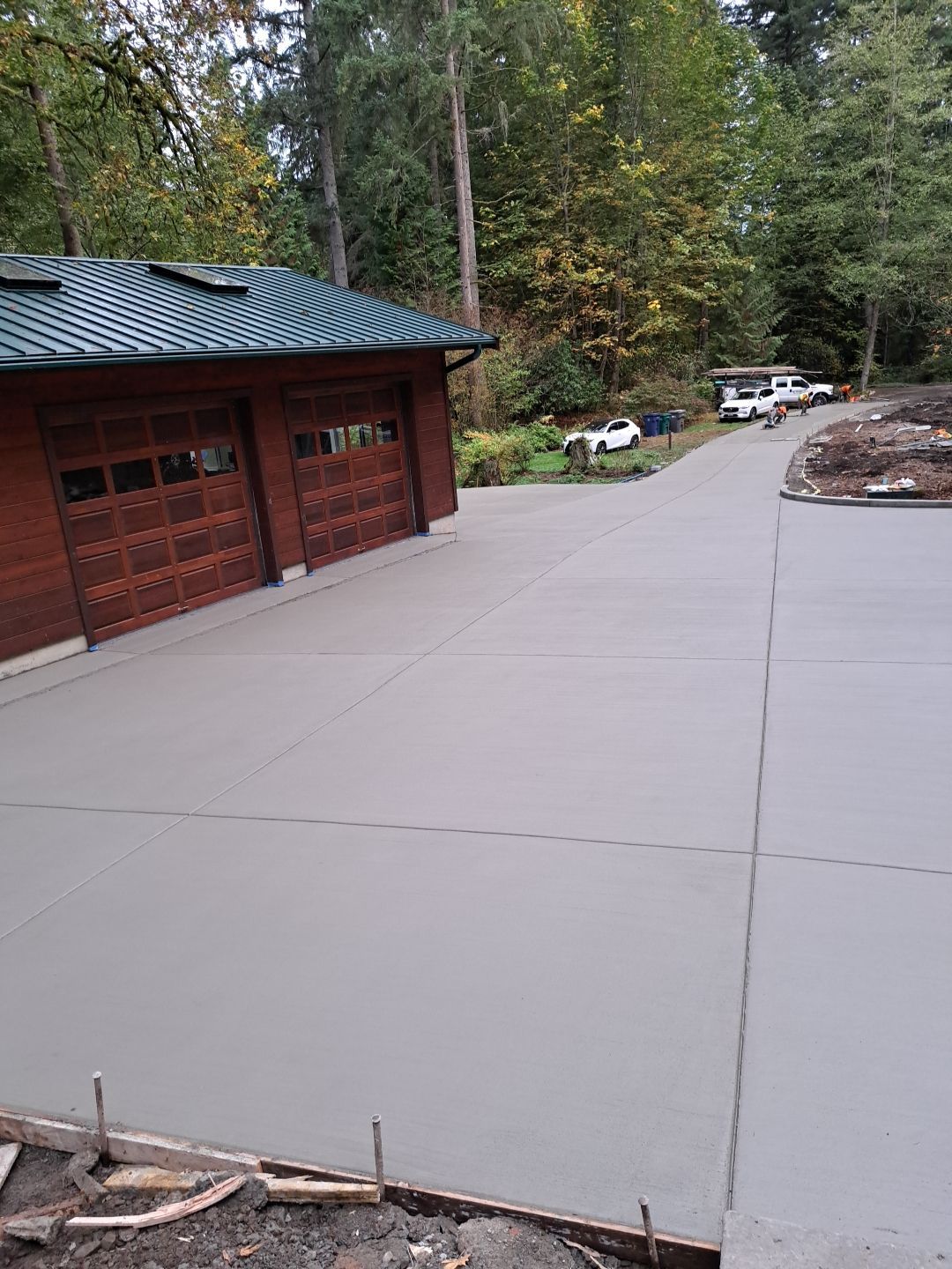 Pia | Custom Concrete Driveway, Walkway & Floating Steps by Jireh Asphalt & Concrete Inc 