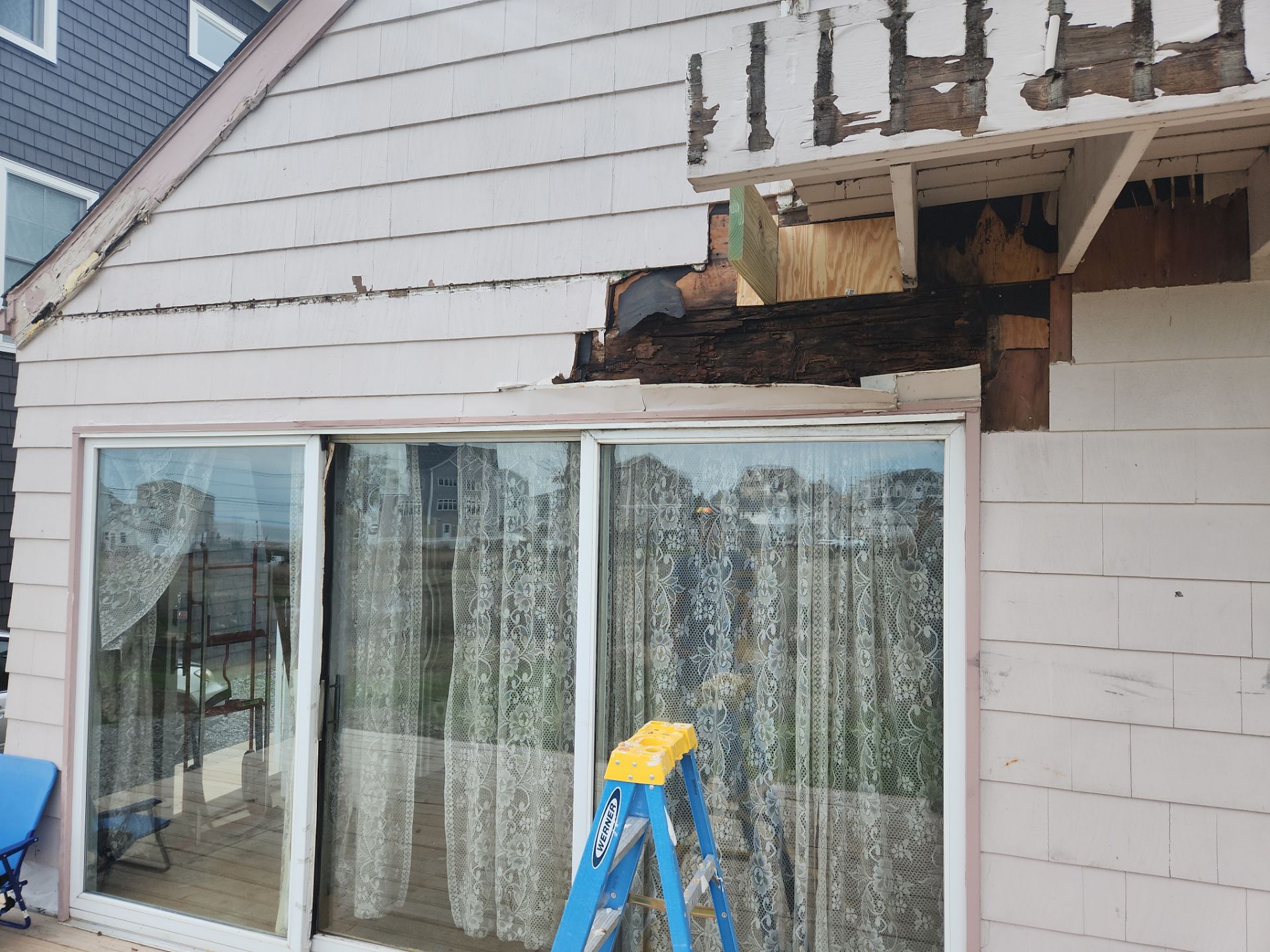 Milford Exterior Renovation Featuring Custom Siding and Wood Deck Installation by A Plus Exterior