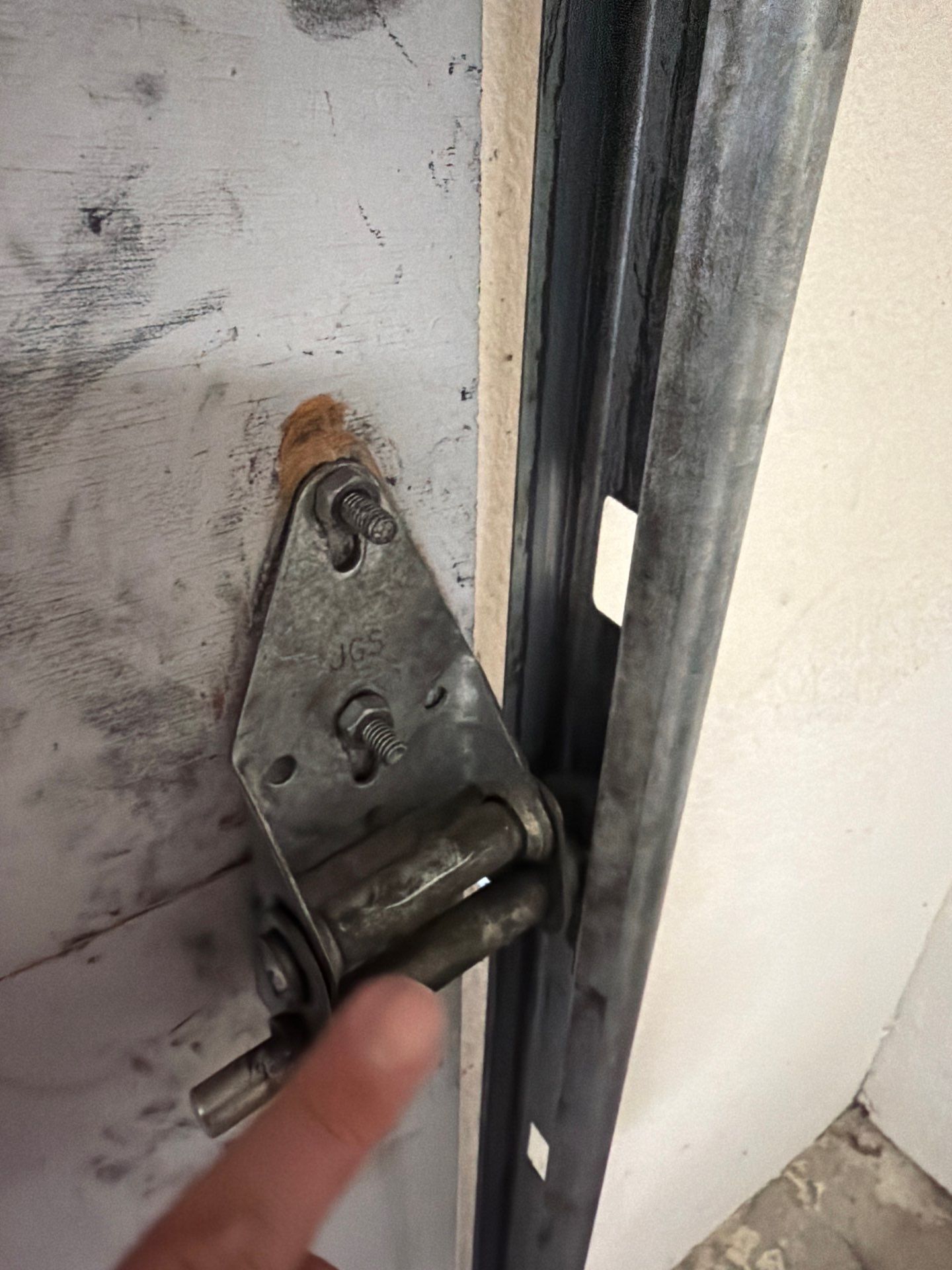 Sectional Garage Door Torsion Spring Replacement and Hardware Service by Valiant Garage Door
