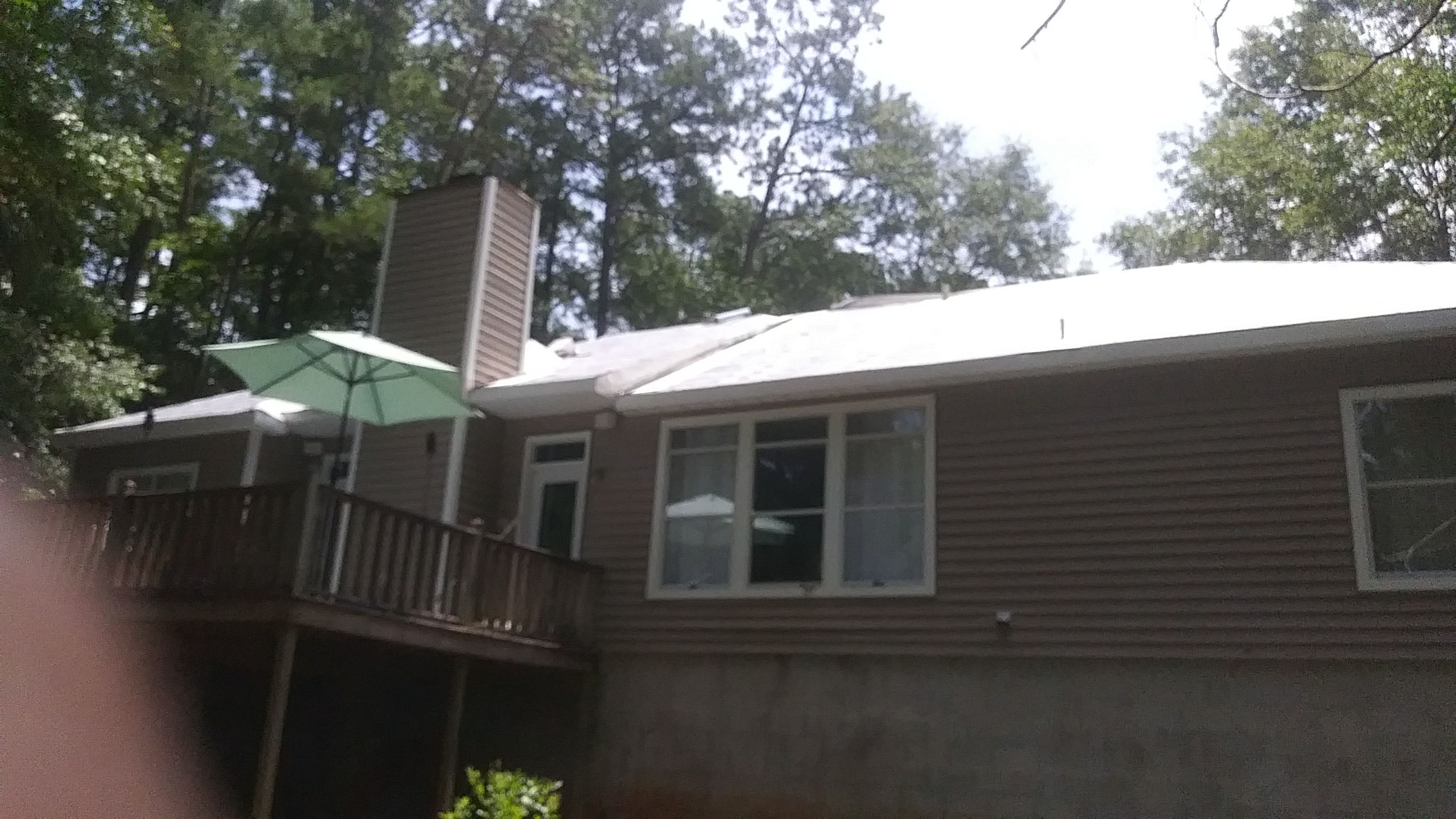 Residential Roofing Installation using Roof Replacement by American Roofing & Construction LLC