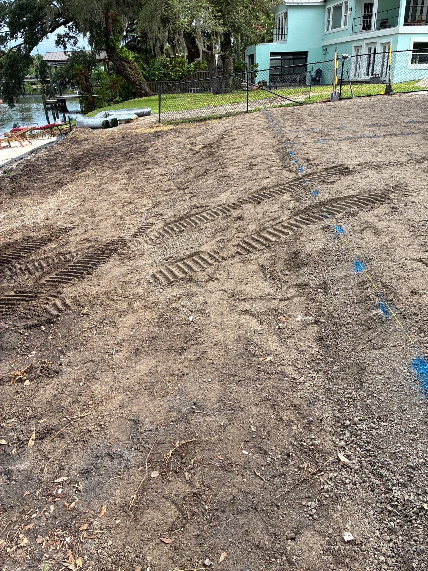 Grading back yard oasis by Level One Grading