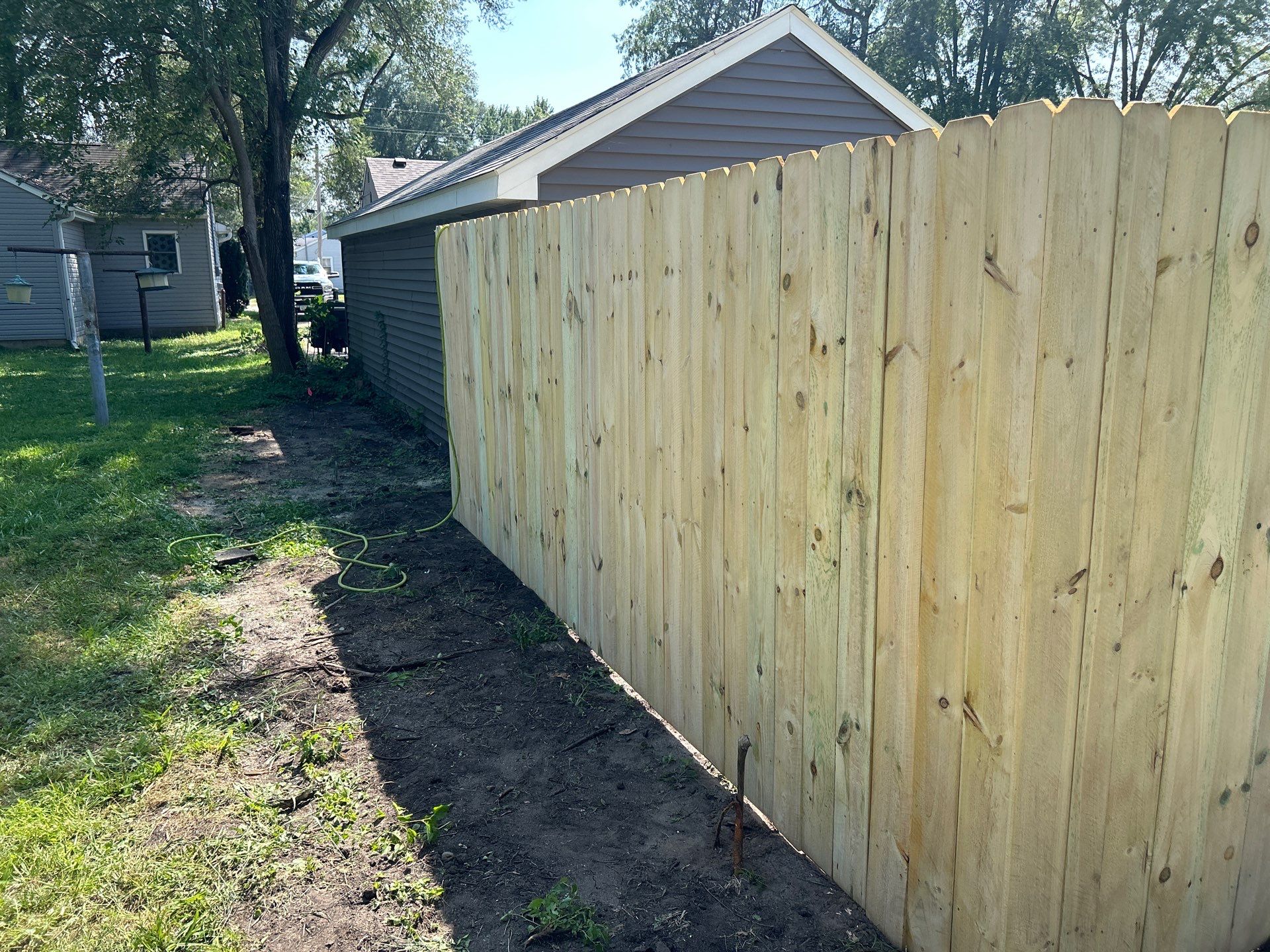 Treated Pine Privacy and Picket Fence Installation in Evansdale by Perfect Picket Fence and Stain