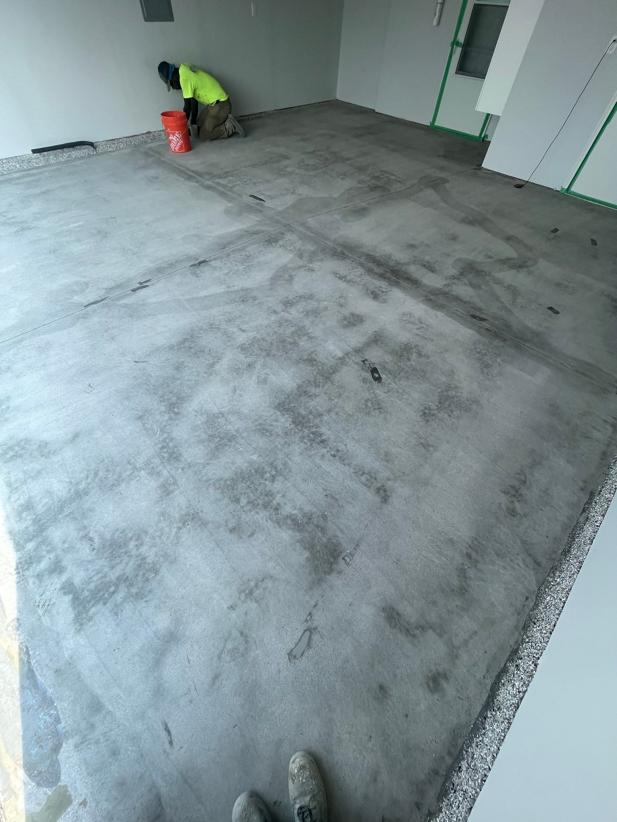 Custom Coyote Flake Garage Floor Coating in Sioux Falls by Select Painting, Coatings & Garage Cabinets
